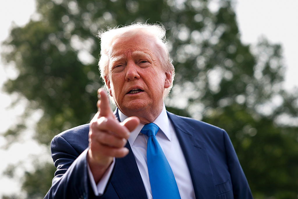 Donald Trump speaks to the media as he leaves the White House in Washington, D.C. on April 25, 2025. | Source: Getty Images