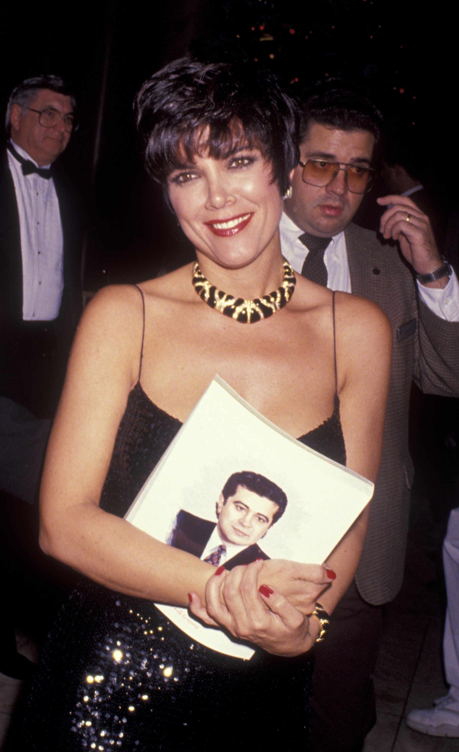Kris Jenner attends the Pioneer Awards honoring Terry Semel at the Century Plaza Hotel in Century City, California, on December 10, 1990, wearing a glamorous black ensemble with a statement necklace. | Source: Getty Images