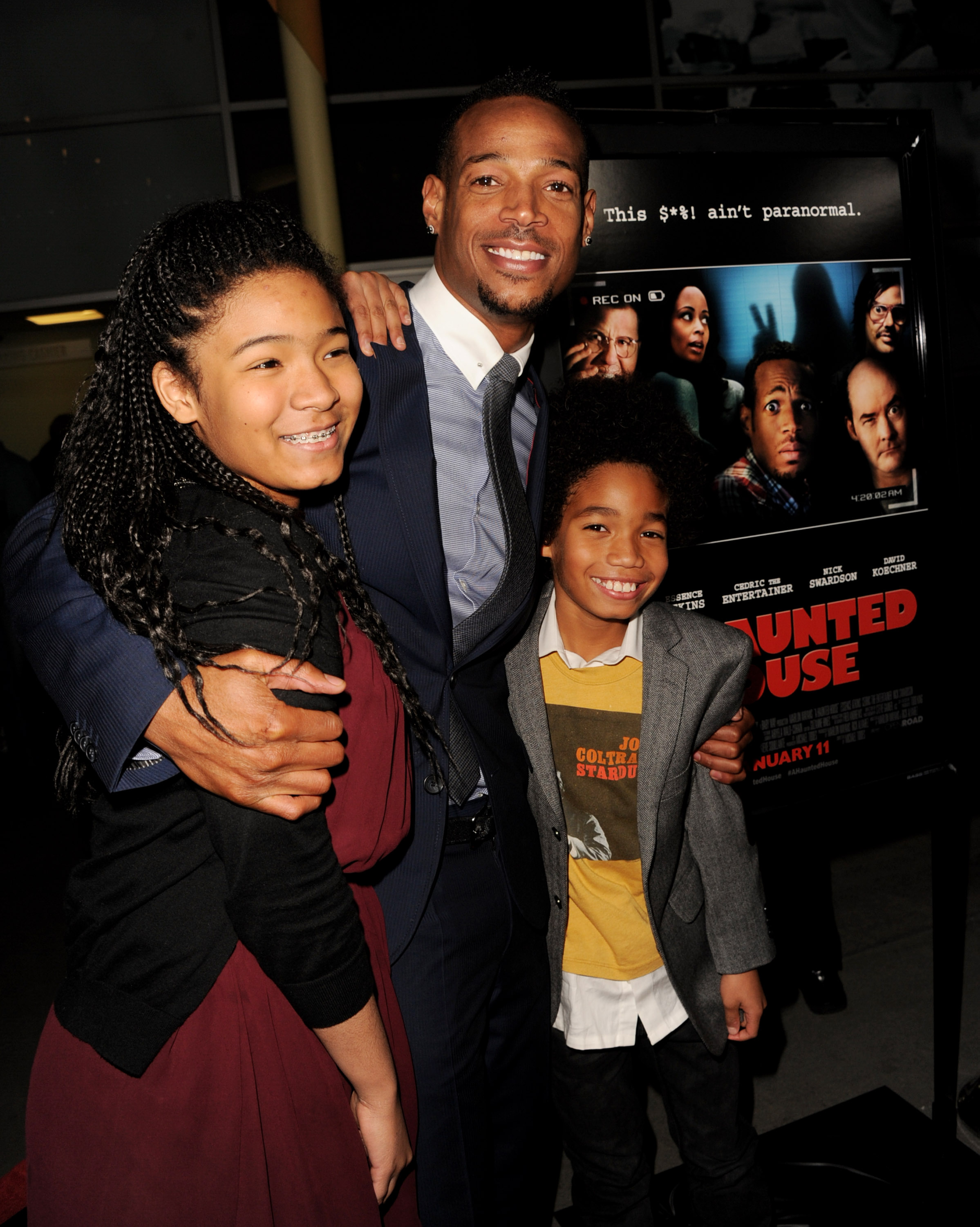 Marlon Wayans, Kai Wayans, and Shawn Wayans attend the premiere of "A Haunted House" at the Arclight Theatre on January 3, 2013, in Los Angeles, California | Source: Getty Images