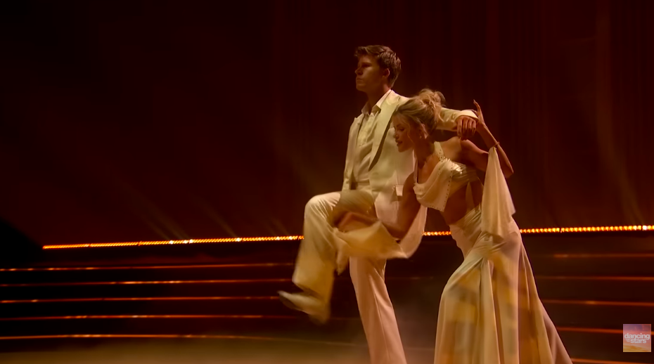 Witney Carson guiding Robert Irwin at the start of their Foxtrot on "DWTS," posted on November 12, 2025. | Source: YouTube/Dancing With The Stars