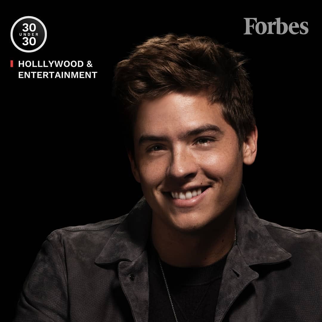 Dylan Sprouse smiling in a photo for his Forbes 30 Under 30 nomination, posted on December 7, 2019. | Source: Instagram/allwisemeadery
