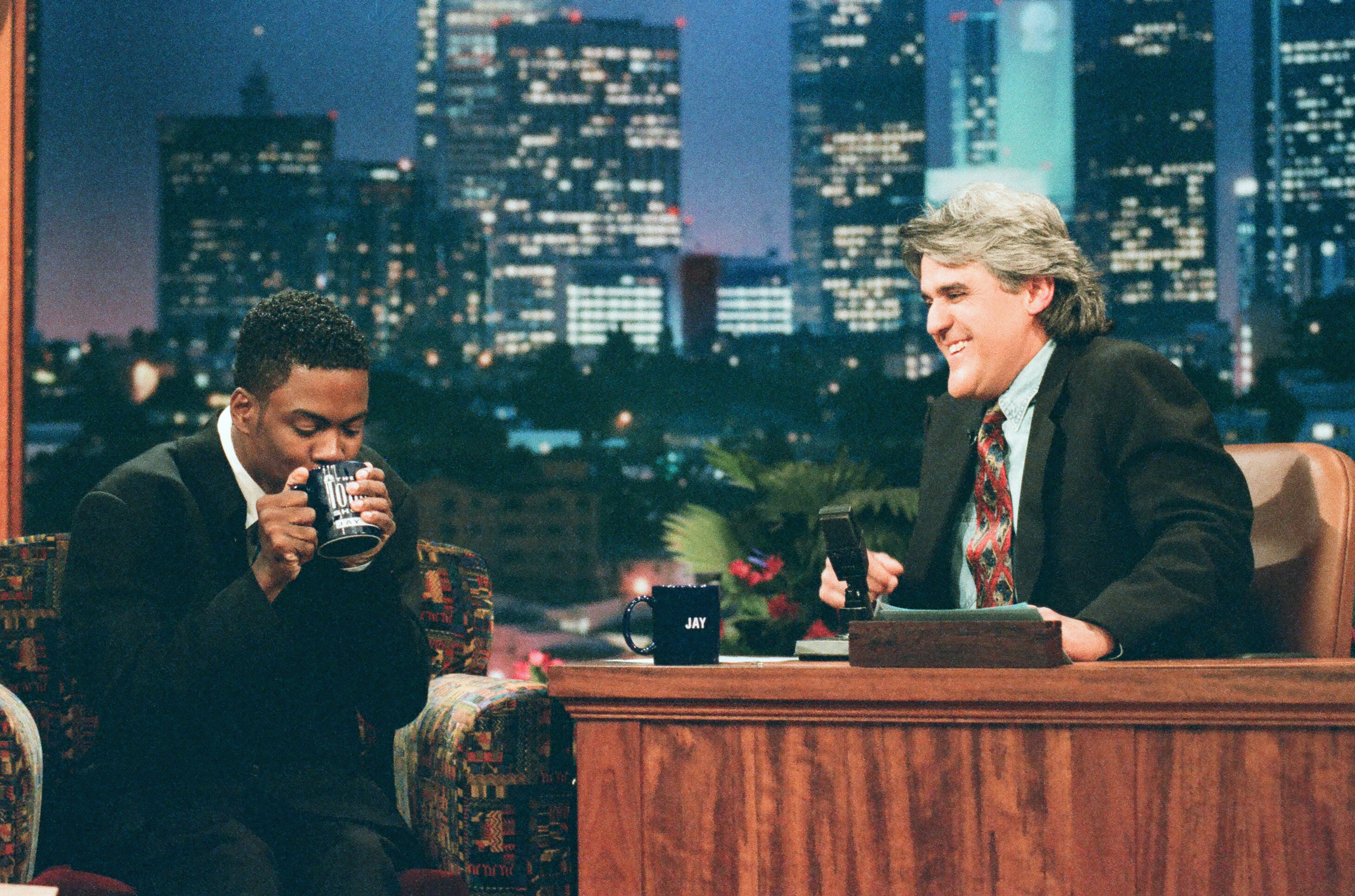 The comedian is pictured during an interview with host Jay Leno on May 31, 1996 | Source: Getty Images