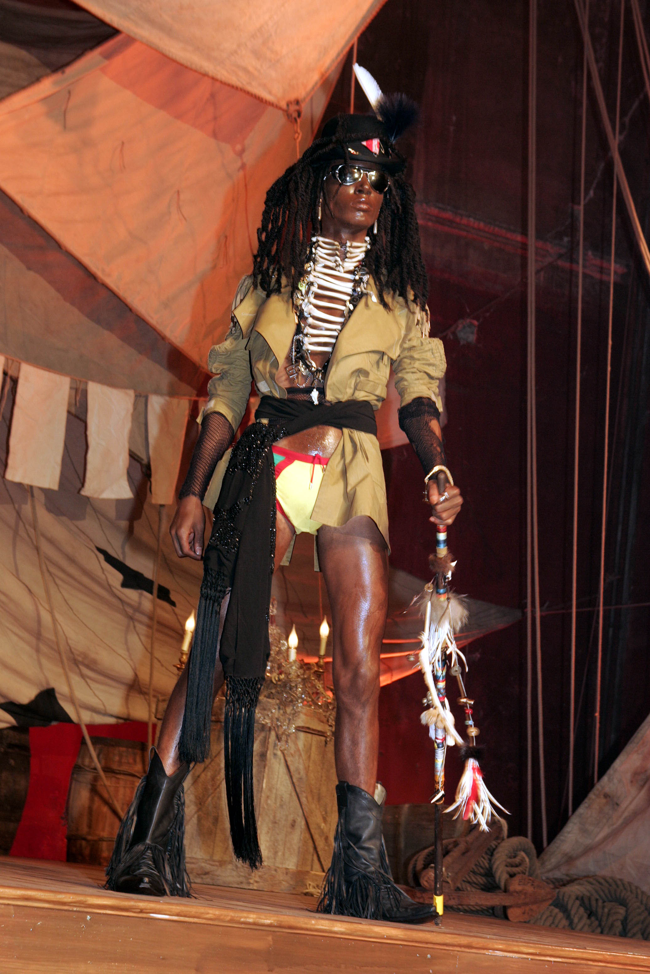 Grace Jones's son, Paulo Goude, wearing John Galliano at the Men's Fashion Show Autumn Winter 04-05 in Paris, France on July 2, 2004. | Source: Getty Images