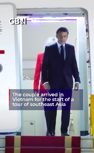 Emmanuel Macron walking ahead of Brigitte Macron as the couple disembarks. | Source: YouTube/GBNews