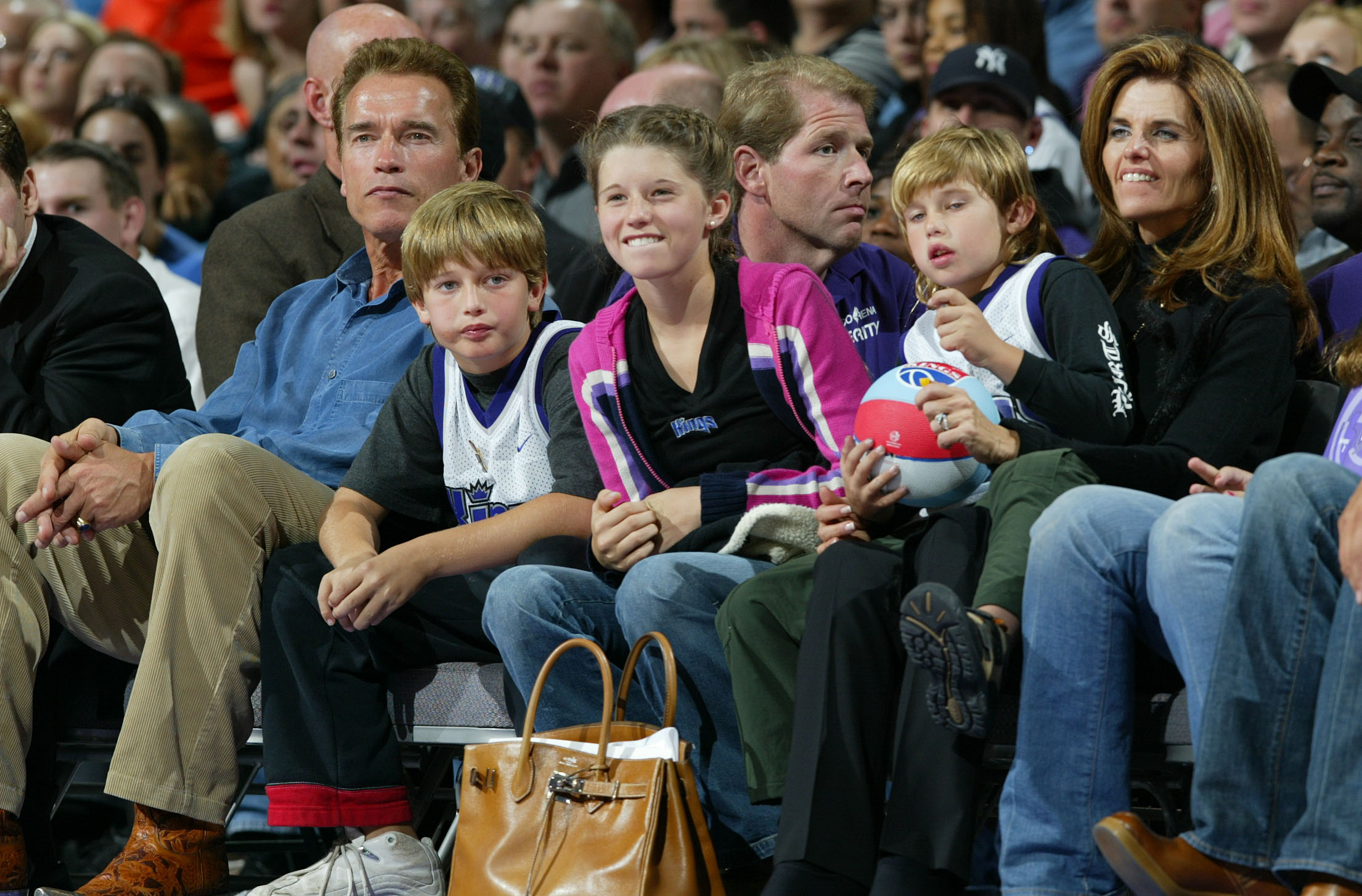Arnold Schwarzenegger and Maria Shriver with their children on November 25, 2003, in Sacramento, California | Source: Getty Images