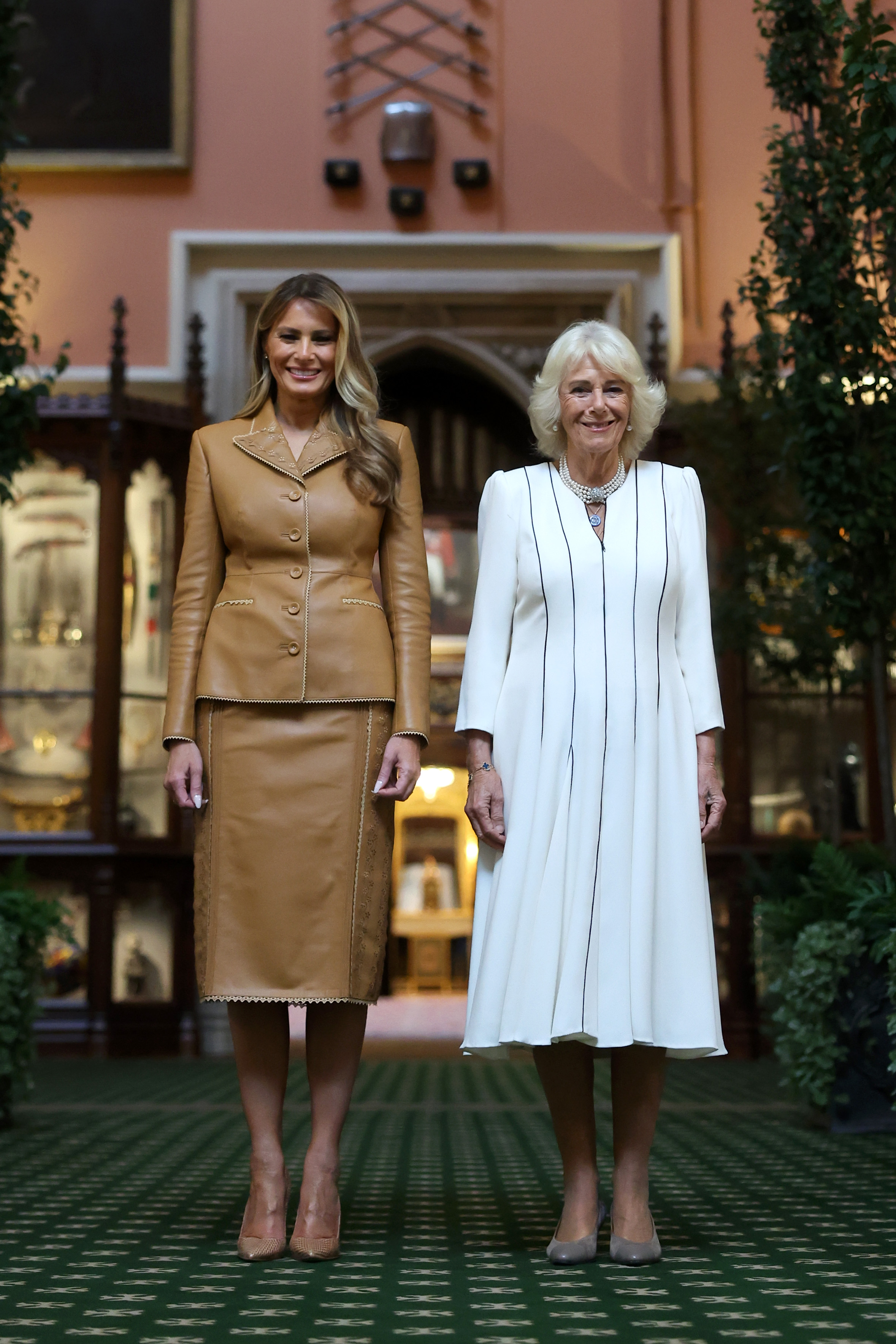 First Lady Melania Trump and Queen Camilla touring Queen Mary's Dolls' House and the Royal Library during the State visit by the President and First Lady of the United States of America at Windsor Castle on September 18, 2025, in England. | Source: Getty Images