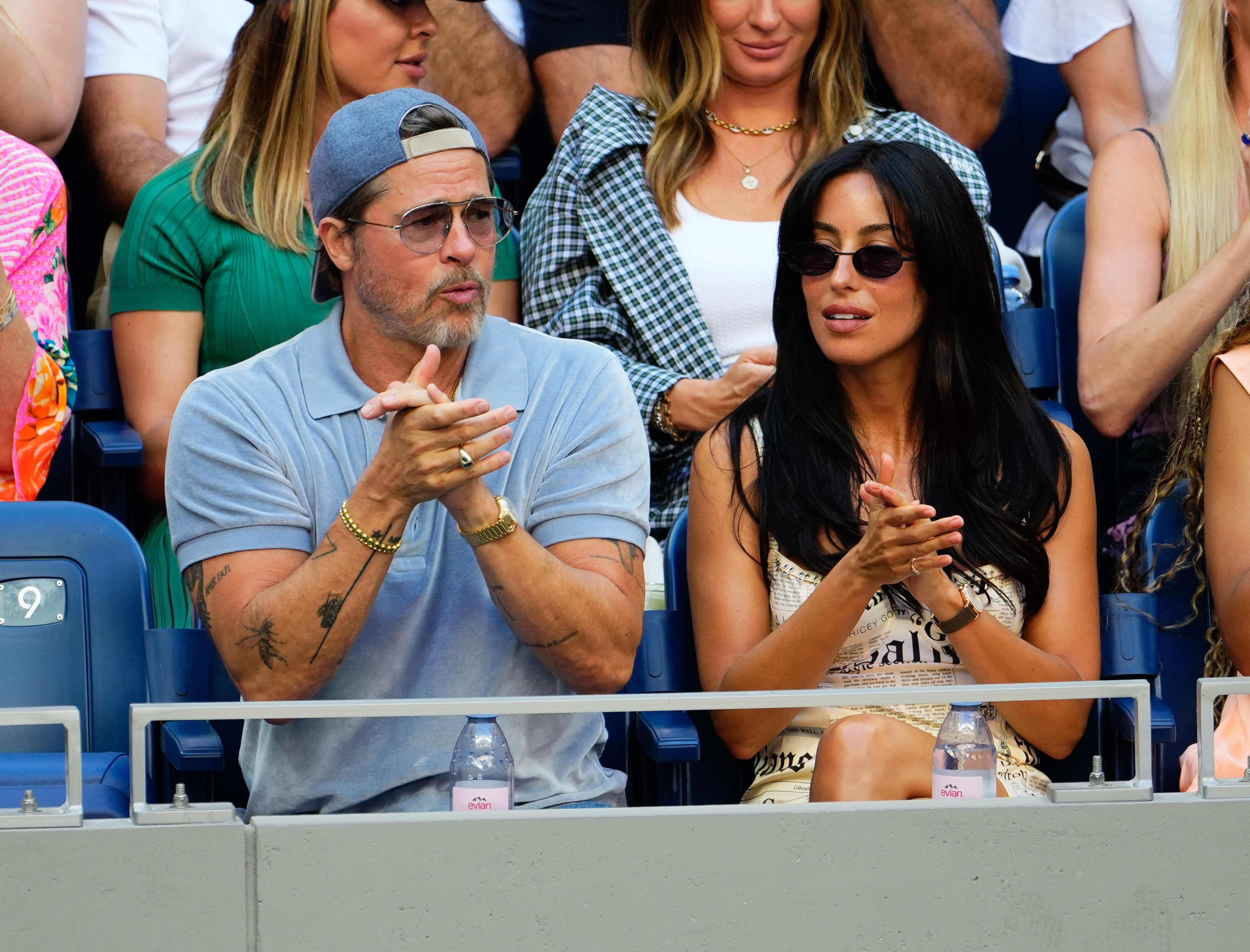 Pitt and de Ramon applauded during the women's singles final. Their Day 14 appearance came one day before de Ramon's floral top at the men's final prompted questions online.