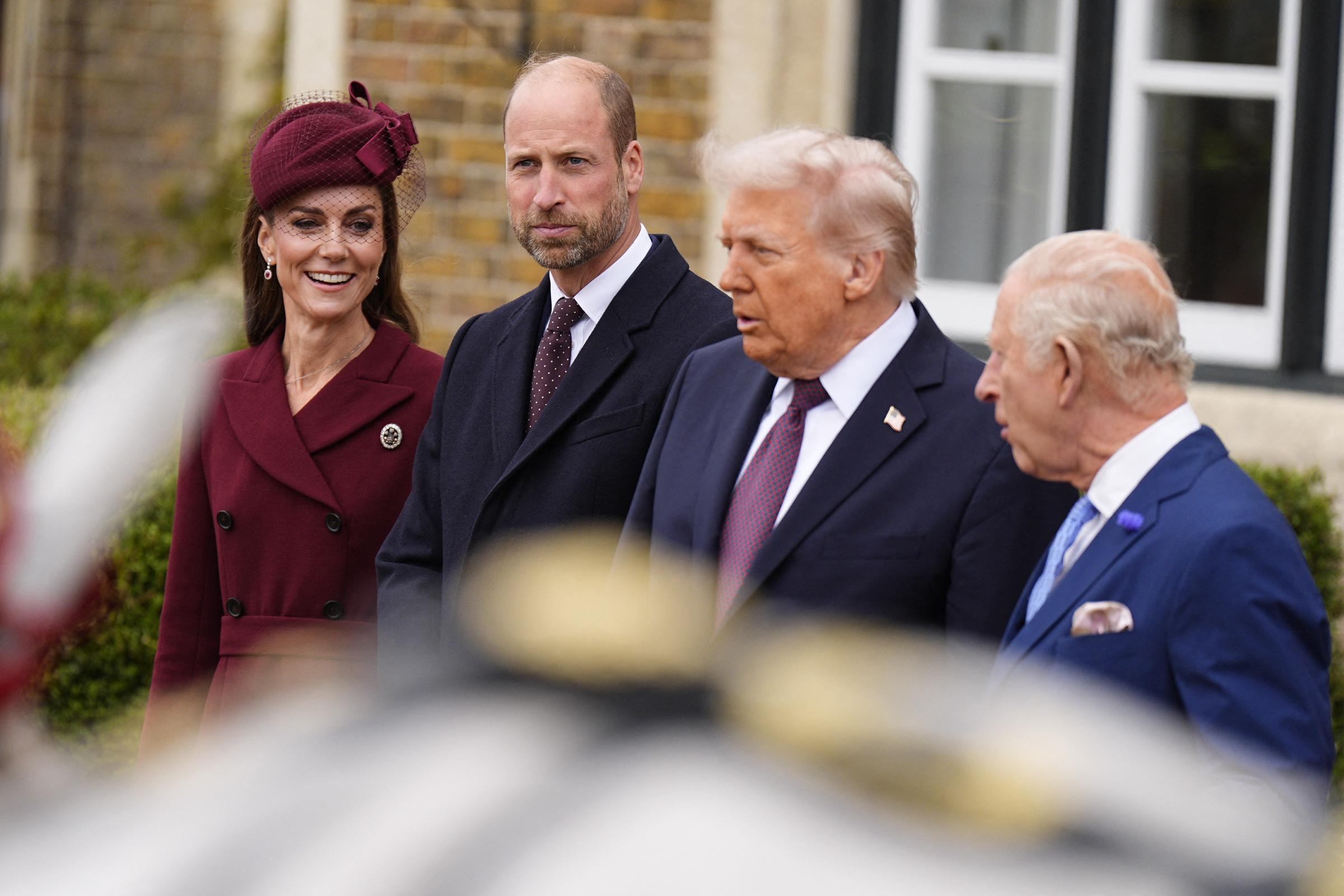 King Charles III talks with Donald Trump, accompanied by Prince William and Princess Catherine, as they await carriages, on September 17, 2025 | Source: Getty Images