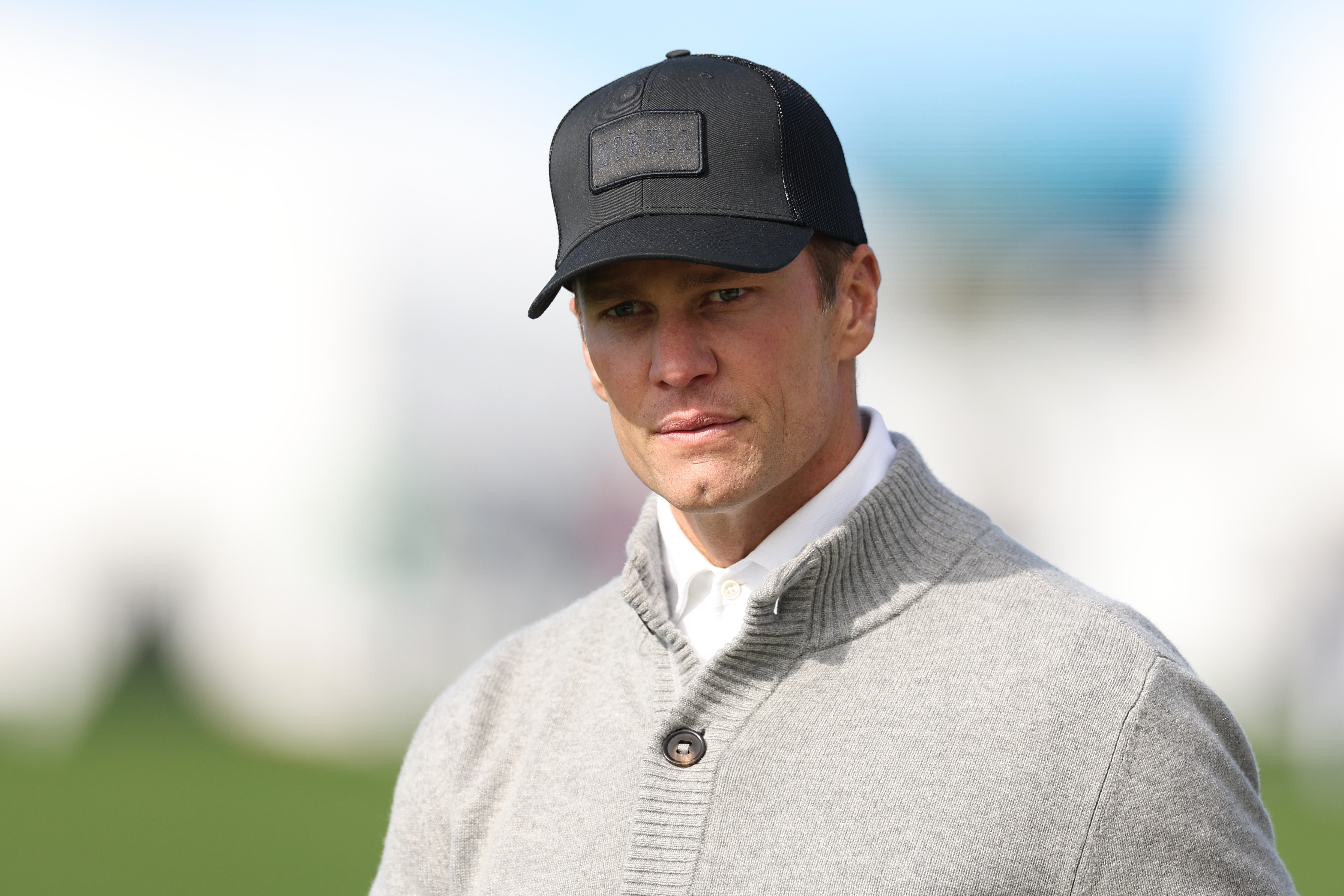 Though retired from football, Tom Brady remains a familiar face in the sports world. He was spotted watching closely during the second round of the AT\&T Pebble Beach Pro-Am at Pebble Beach Golf Links in California. He still carries the same striking presence, though his chiseled, well-defined cheeks have subtly softened with age.