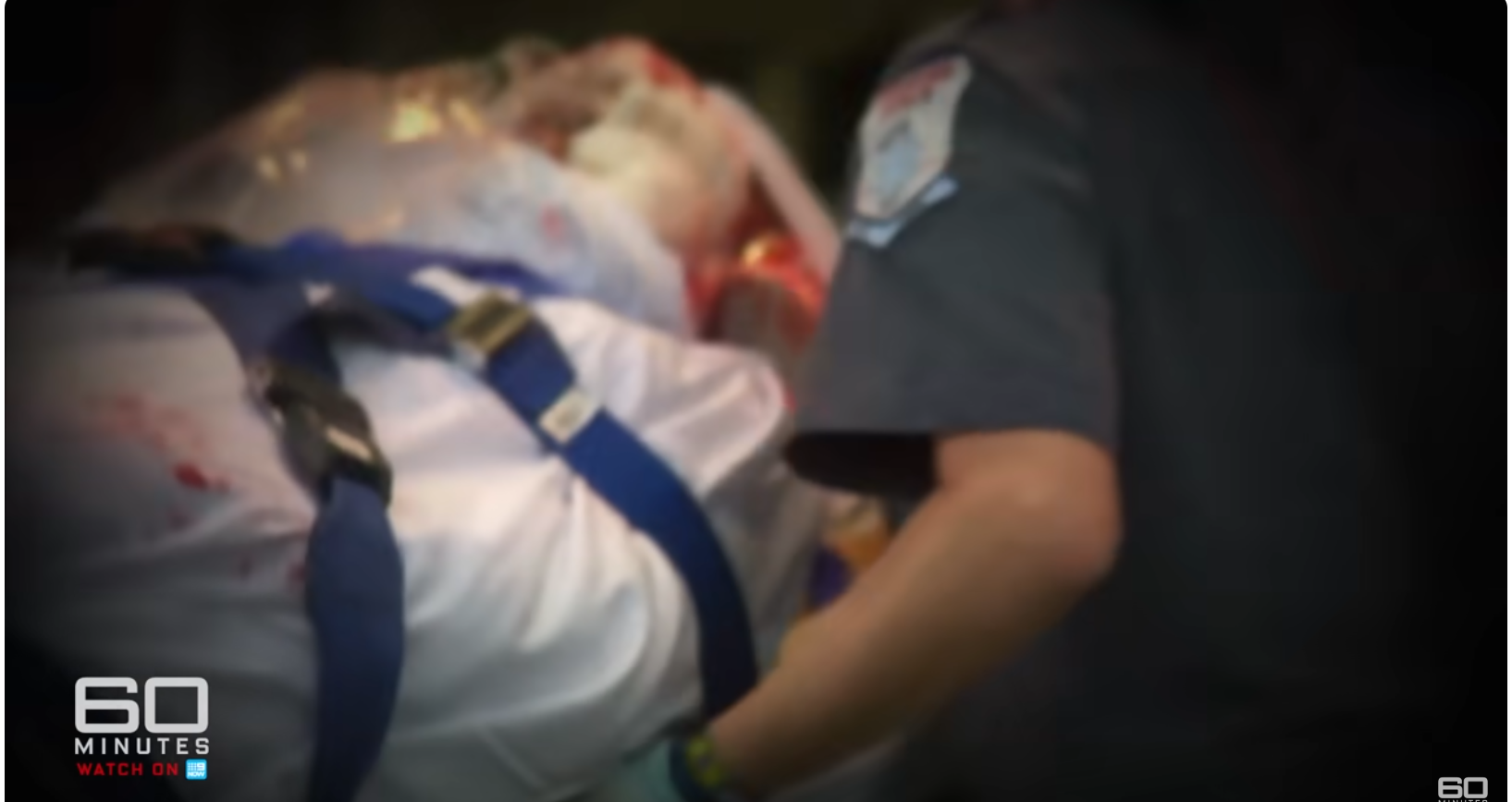 Charla Nash is barely alive as she's being wheeled into an ambulance after Travis attacked her, dated June 11, 2025 | Source: YouTube/60MinutesAustralia