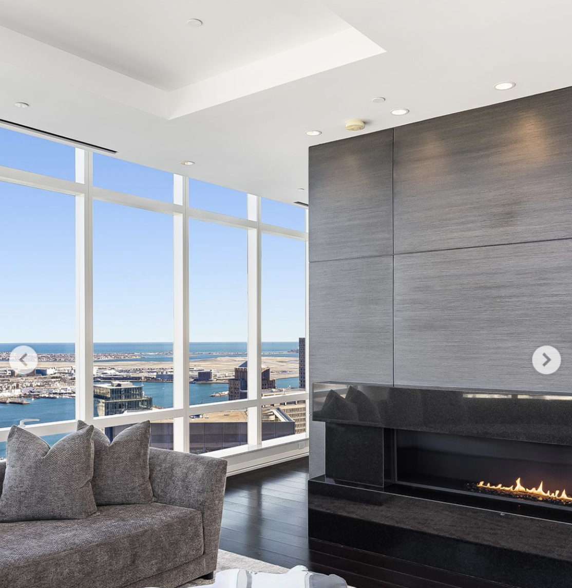 The Boston penthouse comes with a monthly homeowners association fee of approximately $6,862, covering luxury building amenities. | Source: Instagram/ @robbreport