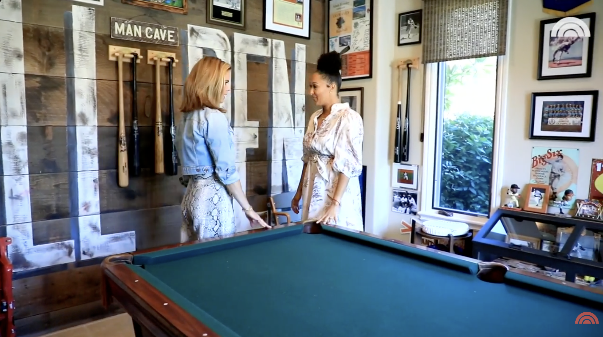 Tamera Mowry taking the "Today" correspondent through her husband's man cave. | Source: YouTube/Today