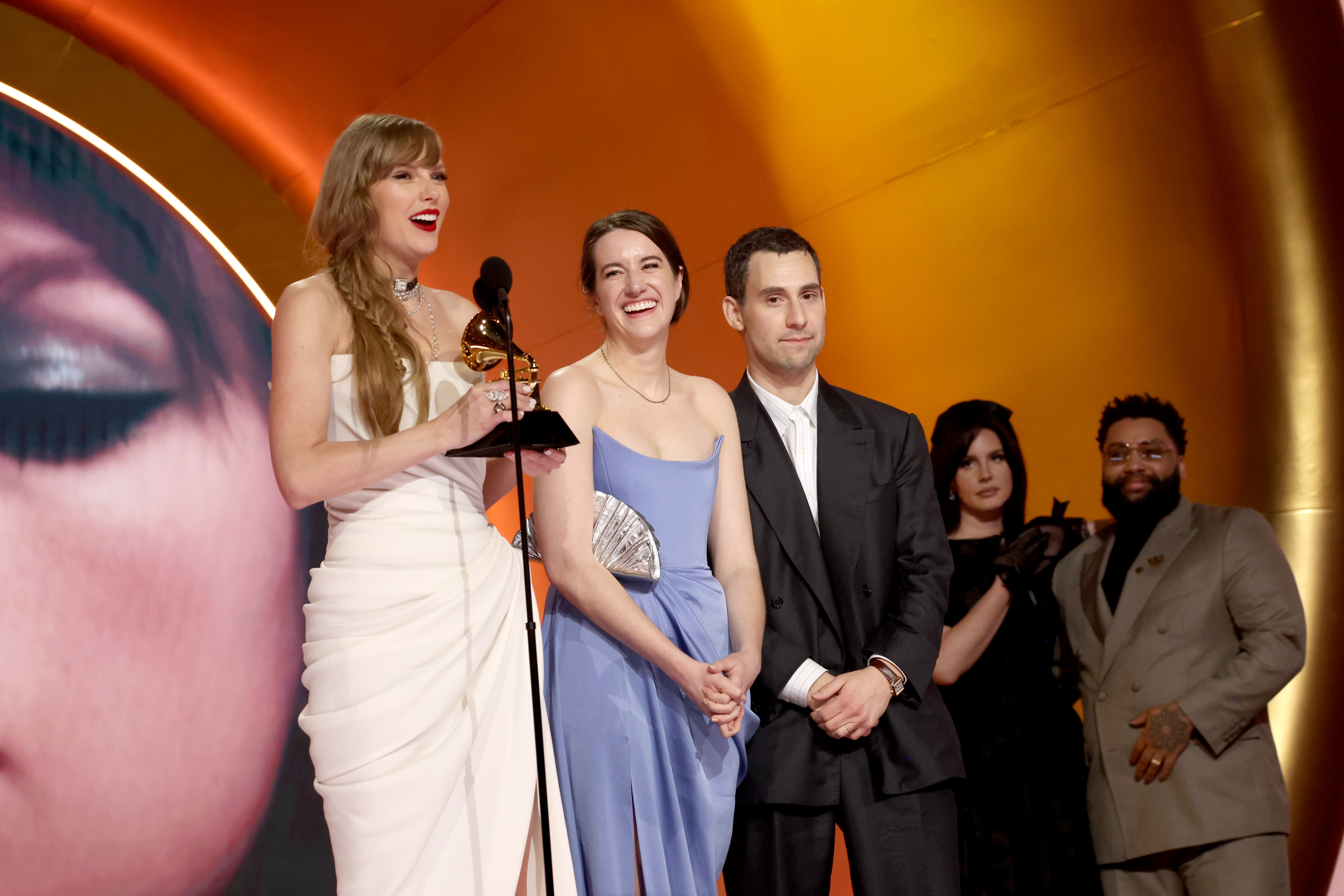Taylor Swift accepts the Album of the Year award for “Midnights” with Laura Sisk, Jack Antonoff and Lana Del Rey onstage at the 66th Grammy Awards at Crypto.com Arena on February 4, 2024, in Los Angeles, California. | Source: Getty Images