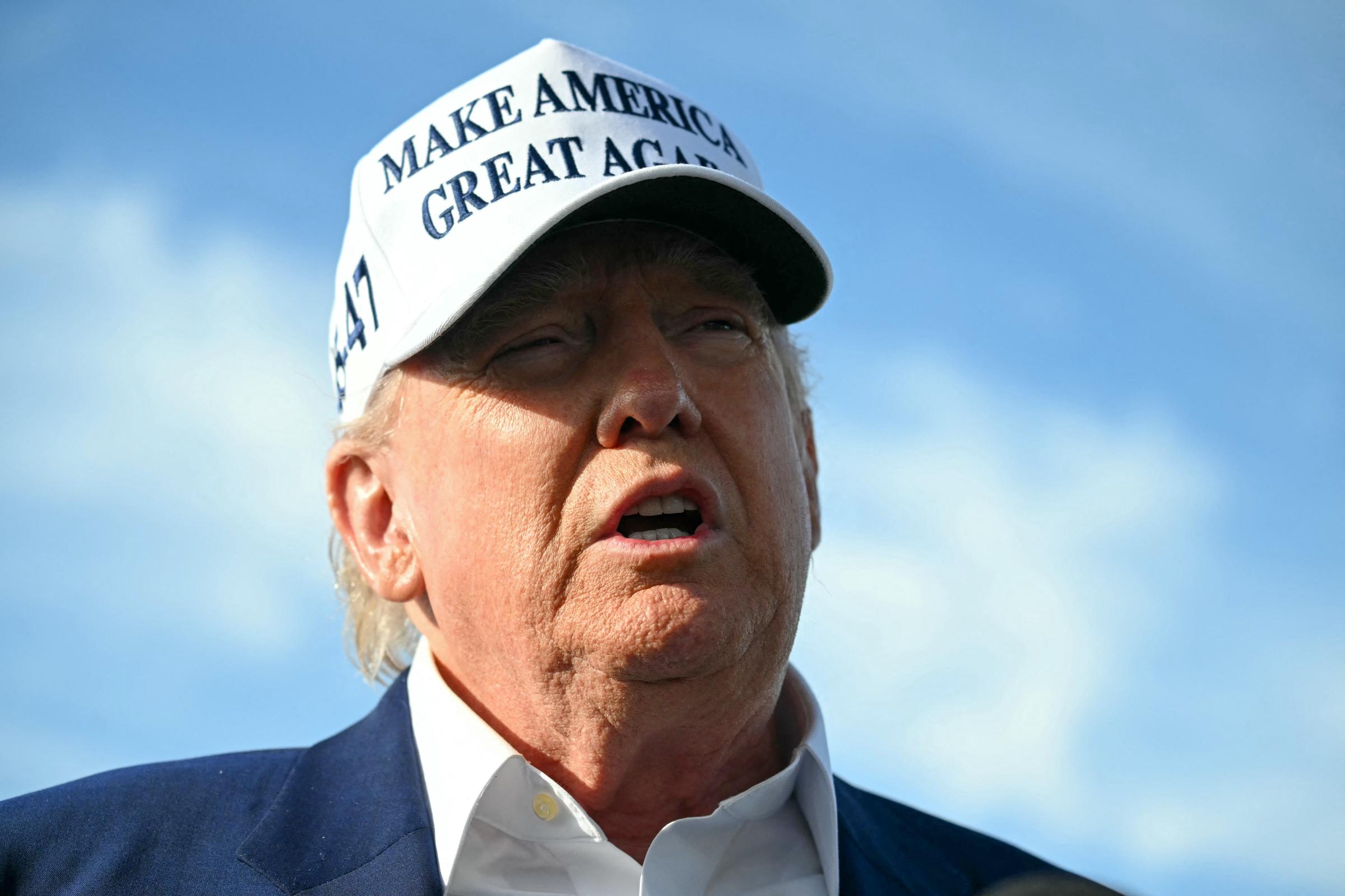 Donald Trump speaks to journalists before boarding Air Force One from Morristown Municipal Airport in Morristown, New Jersey, on May 25, 2025 | Source: Getty Images