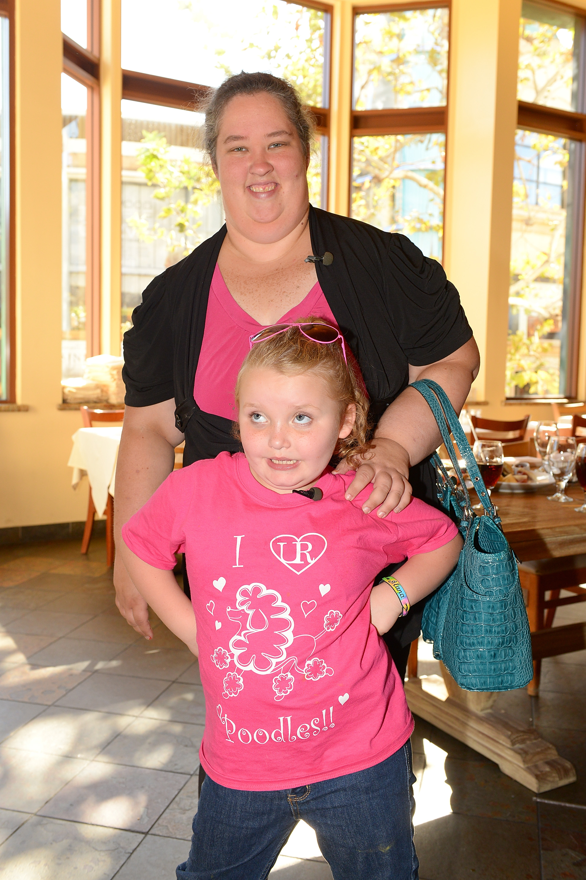 Alana Thompson and June Shannon visit "Extra" at The Grove in Los Angeles, California, on October 15, 2012 | Source: Getty Images