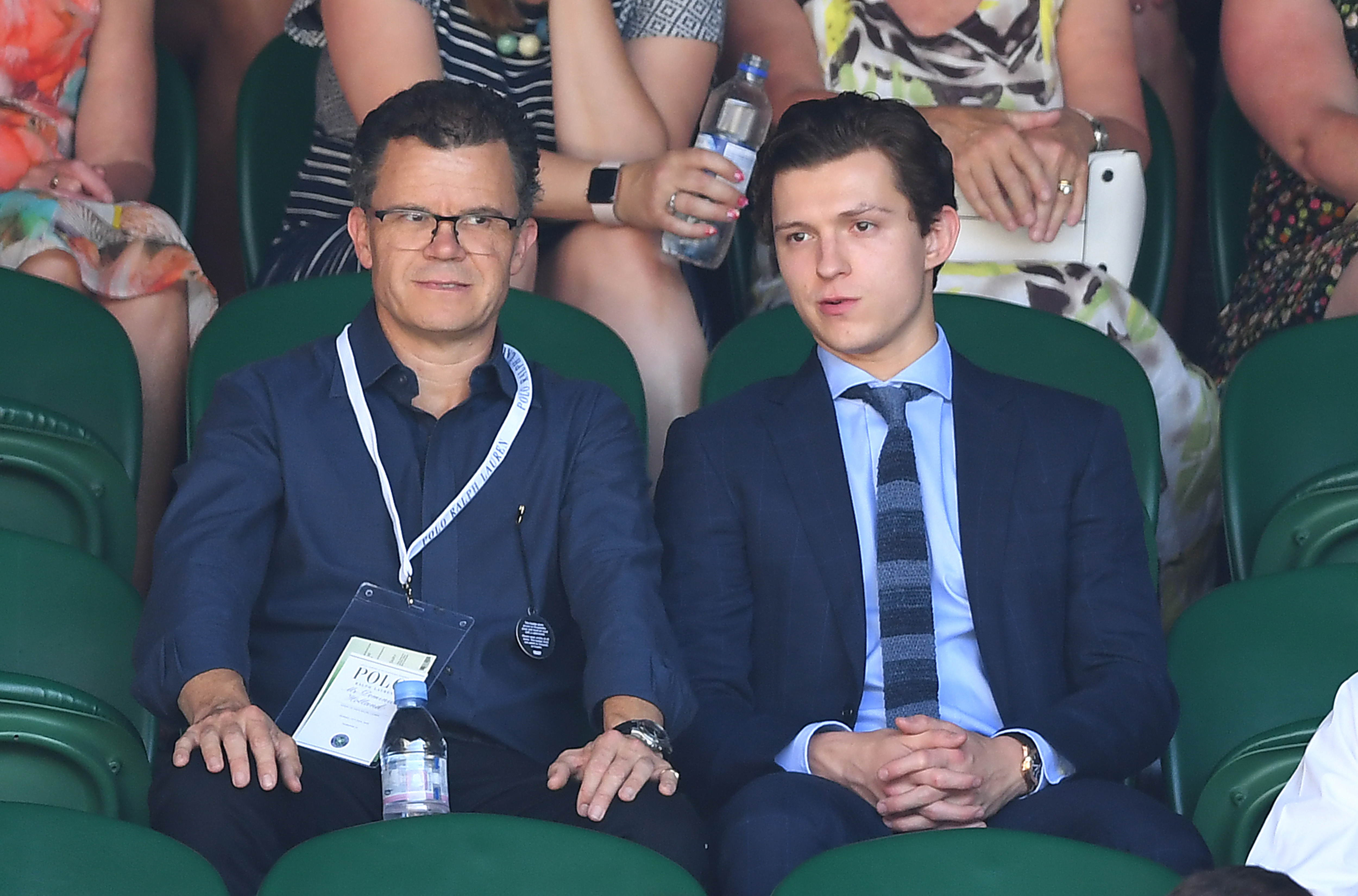 Tom Holland and his father Dominic Holland attend the men's singles final at the Wimbledon Championships in London on July 15, 2018 | Source: Getty Images