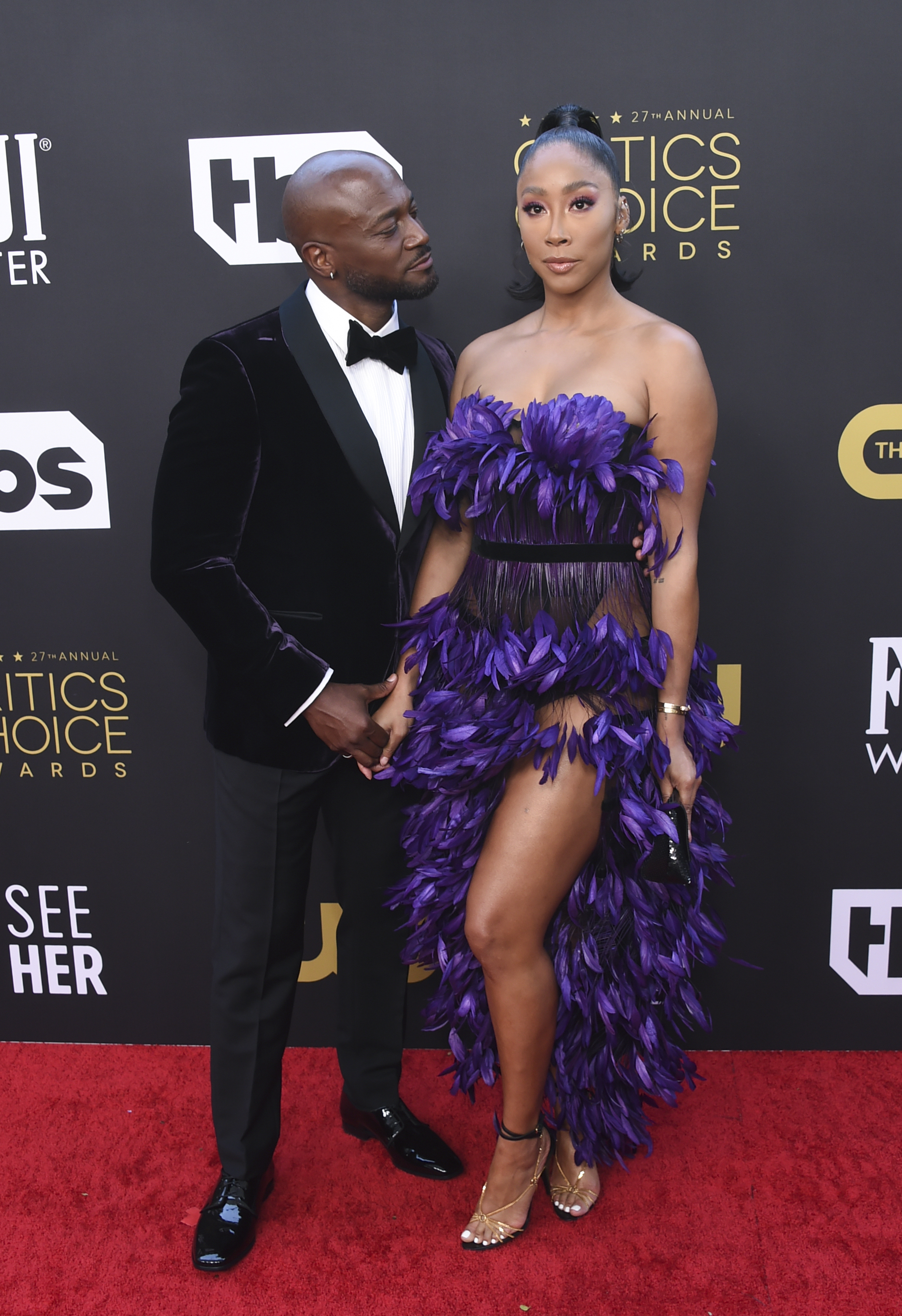 Taye Diggs and Apryl Jones attend the 27th Annual Critics Choice Awards at The Fairmont Century Plaza Hotel on March 13, 2022, in Century City, California | Source: Getty Images