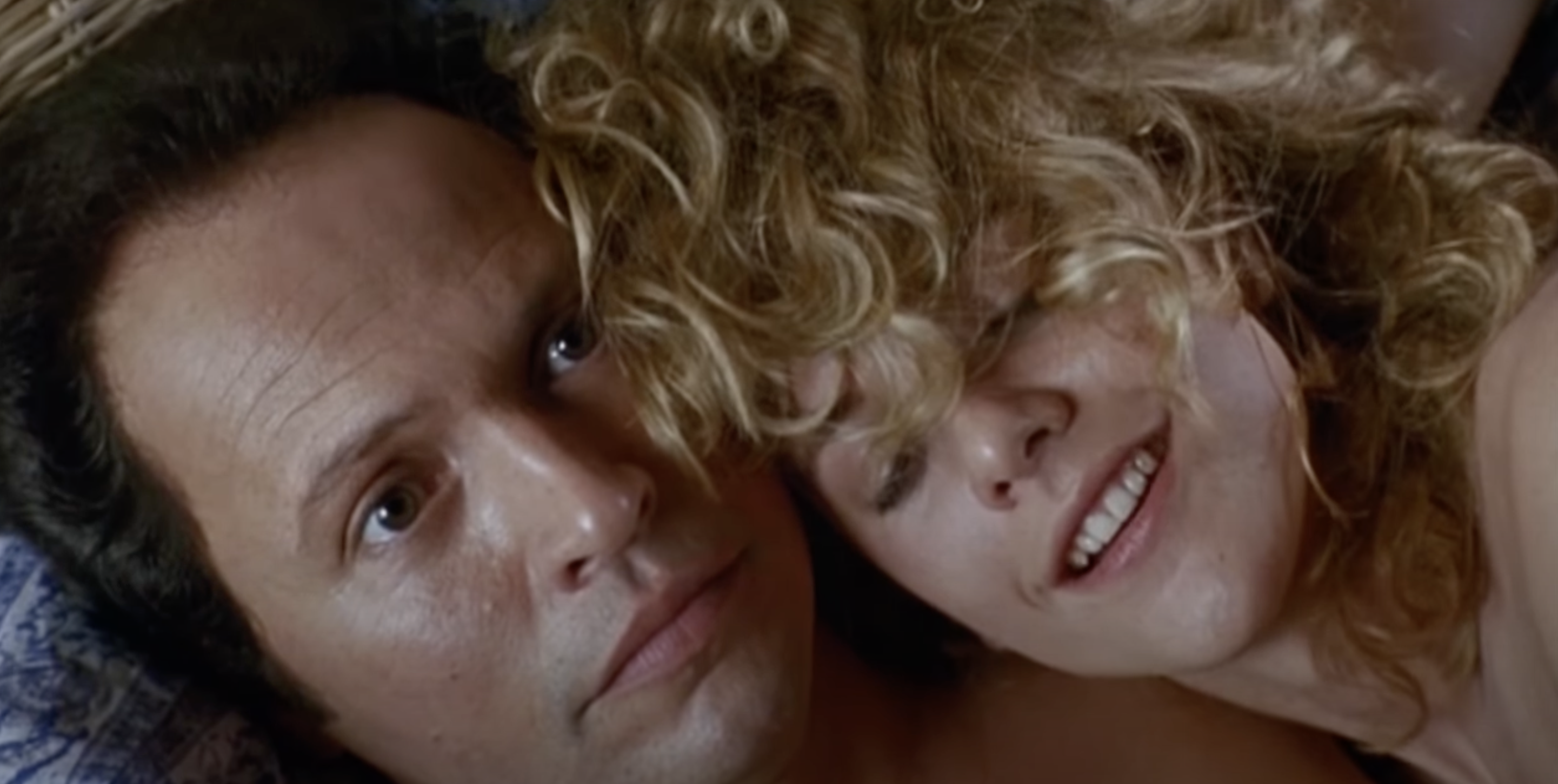Harry and Sally in an intimate scene. | Source: IMDb