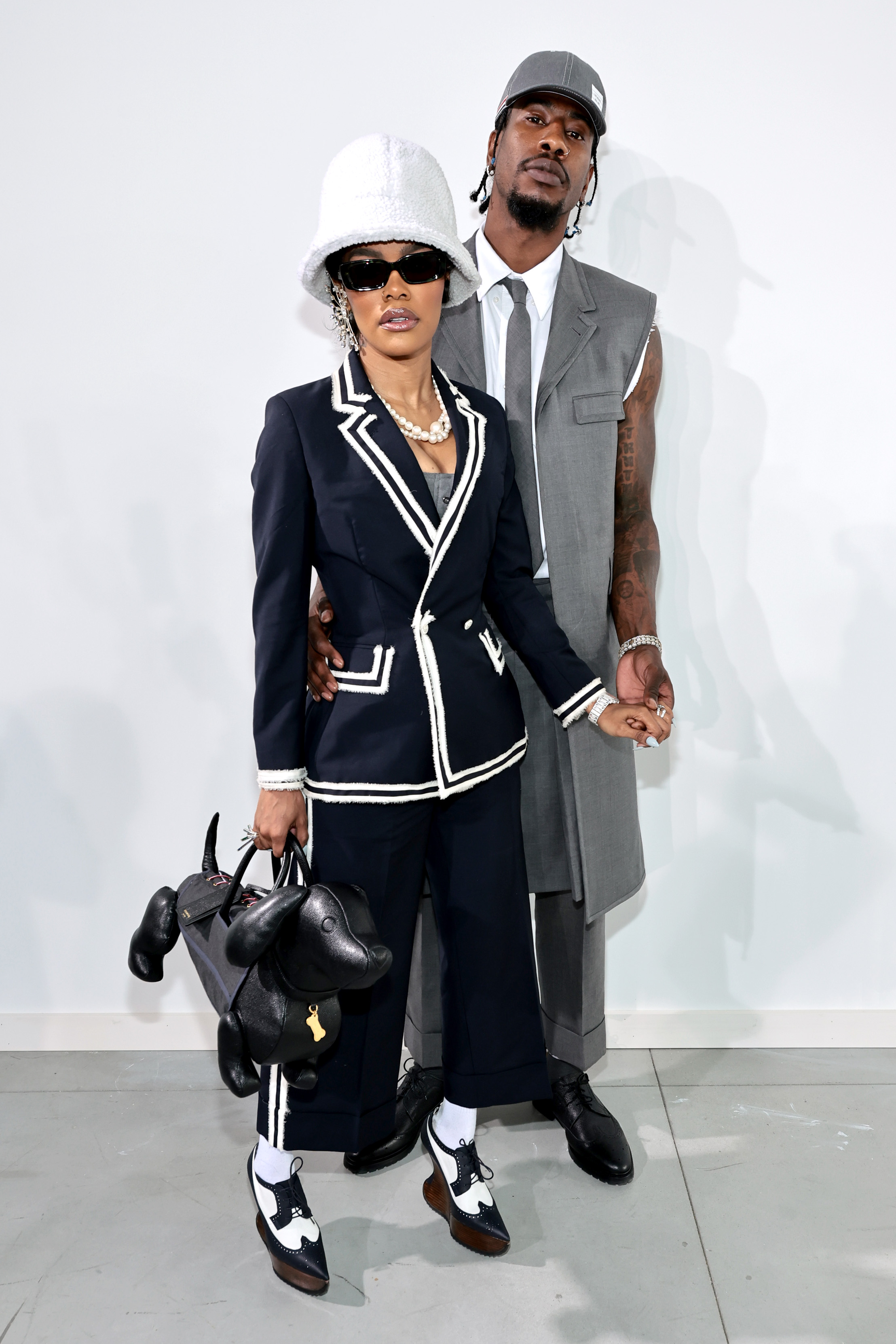 Teyana Taylor and Iman Shumpert attend the Thom Browne Fall runway show in New York City on April 29, 2022. | Source: Getty Images