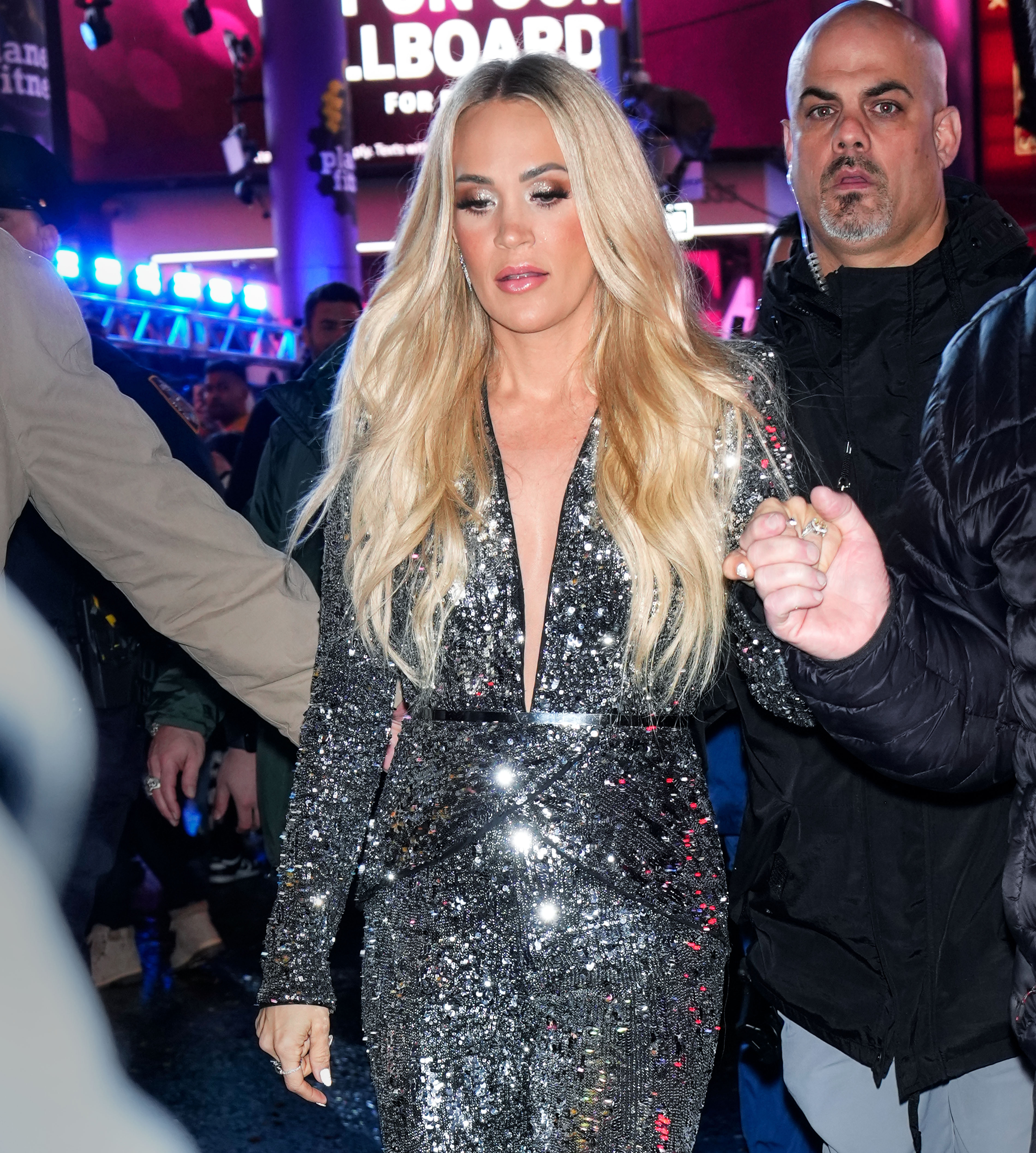 Underwood made her way through New York on New Year's Eve in a sequined silver outfit before the celebrations. Street-style photos offered another glimpse of the singer during a busy period of public appearances. | Source: Getty Images