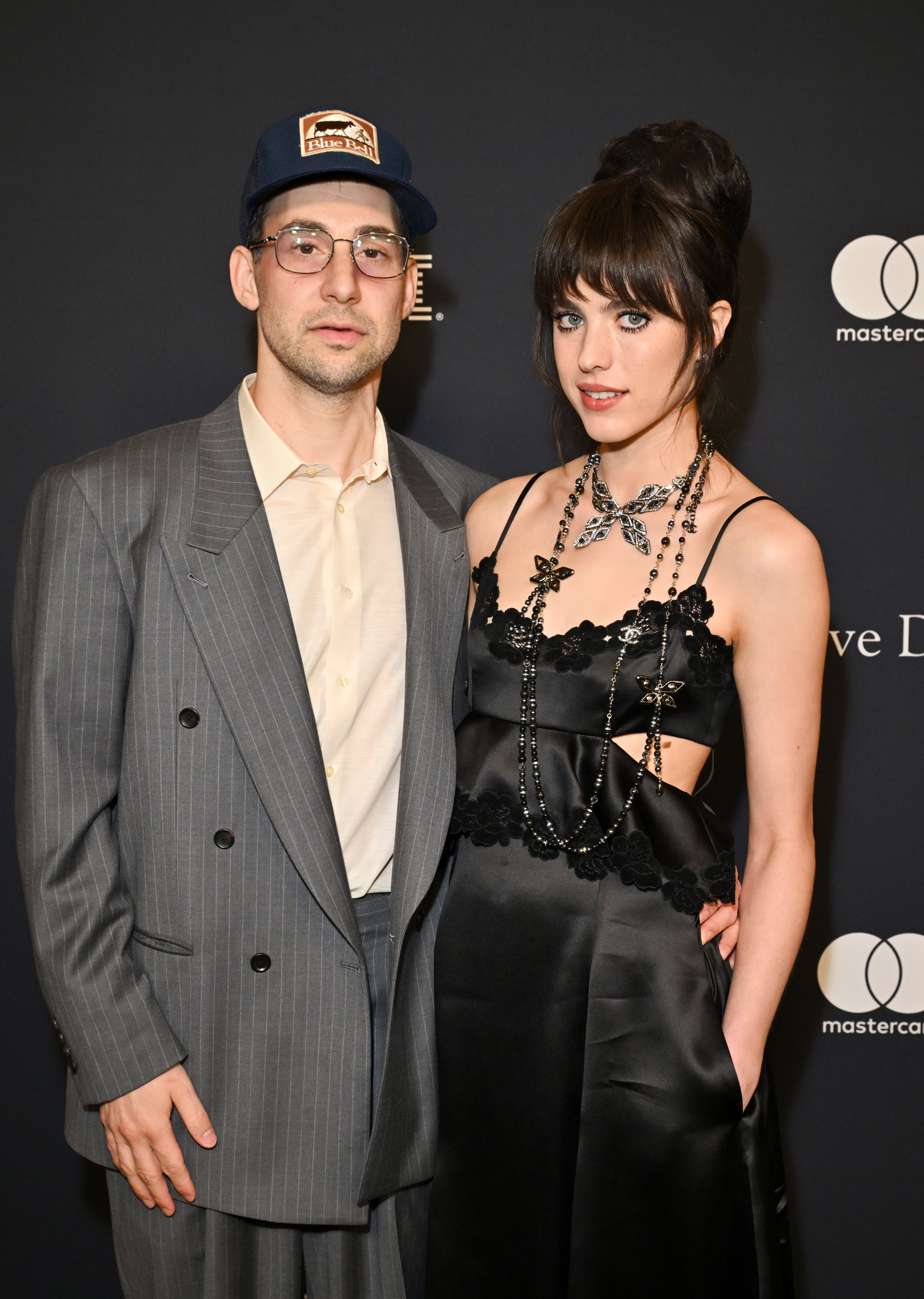 Jack Antonoff and Margaret Qualley pose together at an event, before fans began pointing to possible signs of trouble in their marriage, including reportedly deleted wedding photos and changes to Bleachers' tour setlist. | Source: Getty Images