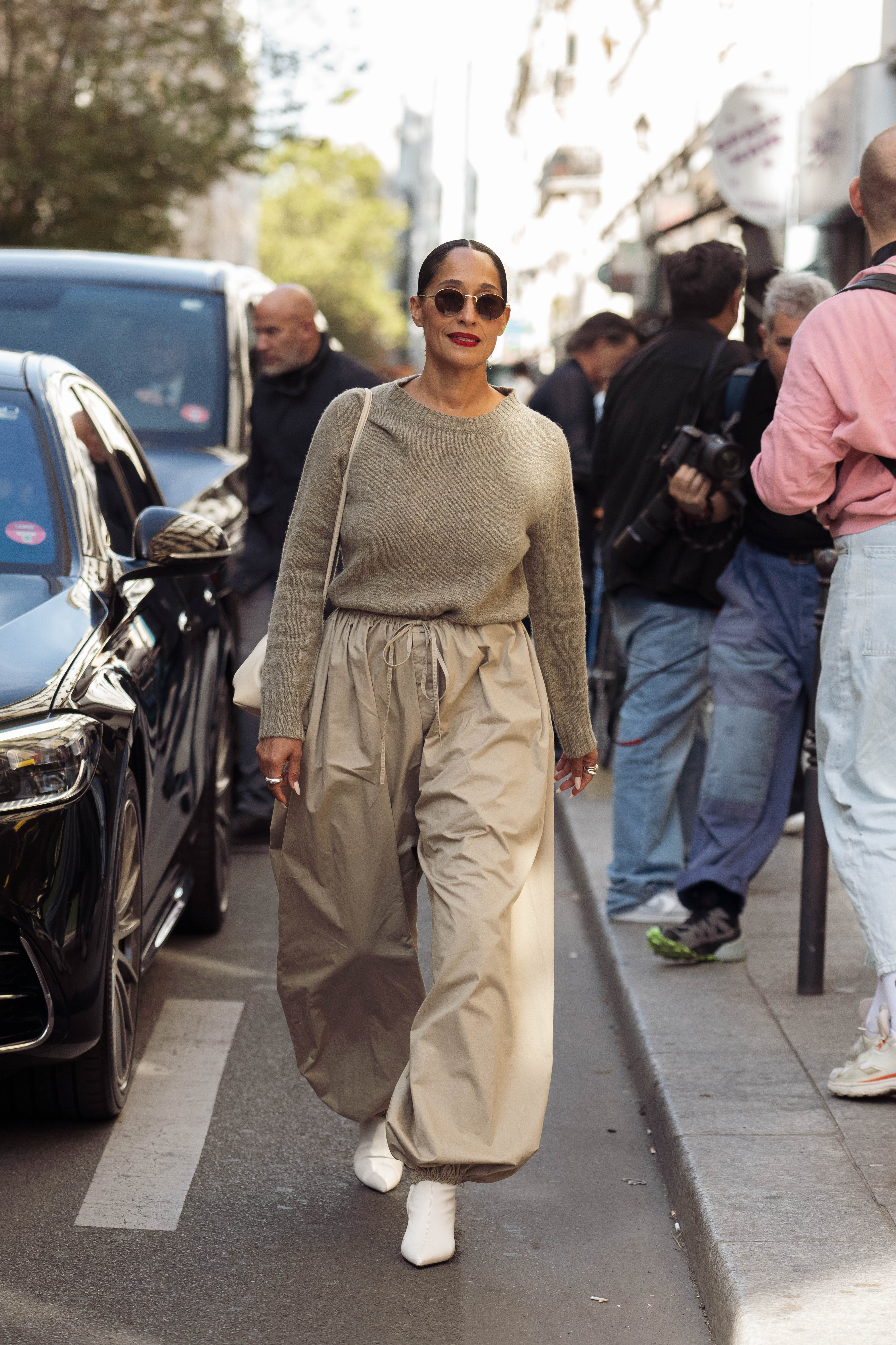 The exaggerated shape of Tracee Ellis Ross' balloon pants makes proportion, rather than accessories, the focus of this street-style moment. She was photographed outside the Celine Spring/Summer 2027 show, where she joined the stars arriving for the presentation. | Source: Getty Images
