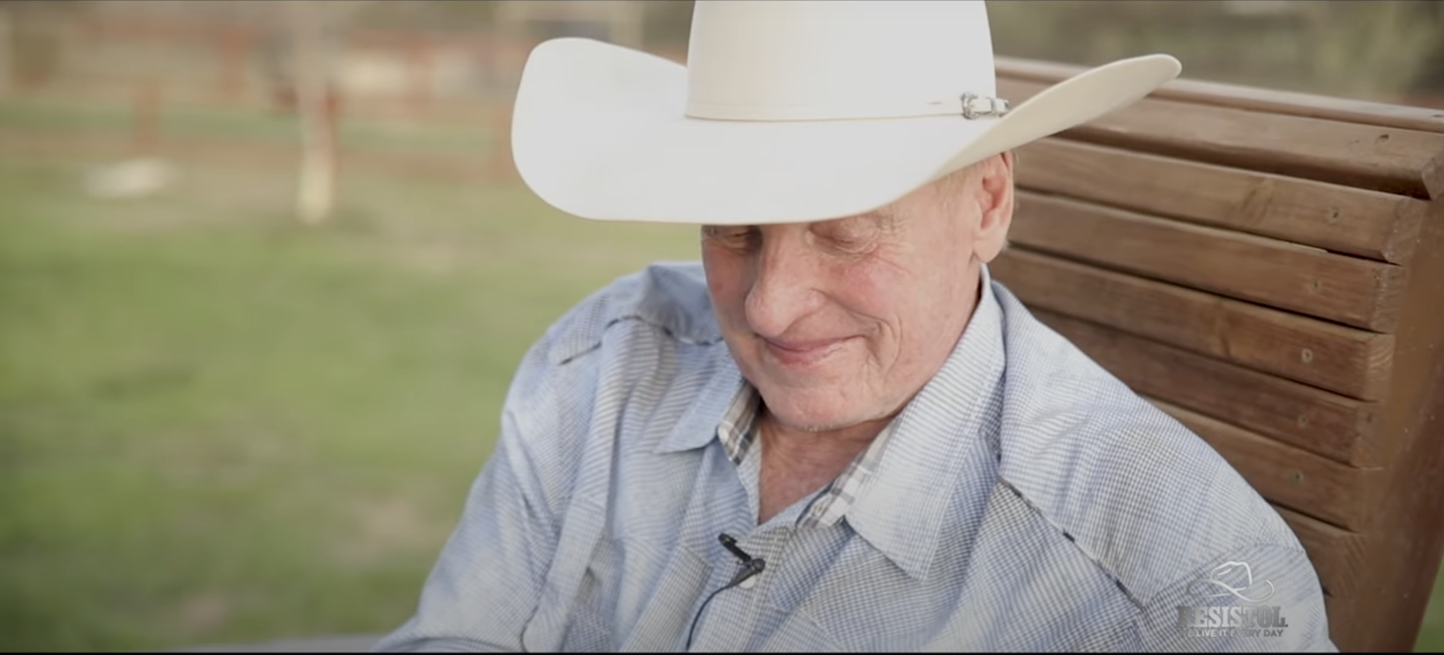 A photo of Roy Cooper smiling as he reflected on his journey as a rodeo, from one of his video interviews, dated July 25, 2023 | Source: YouTube/Resistol