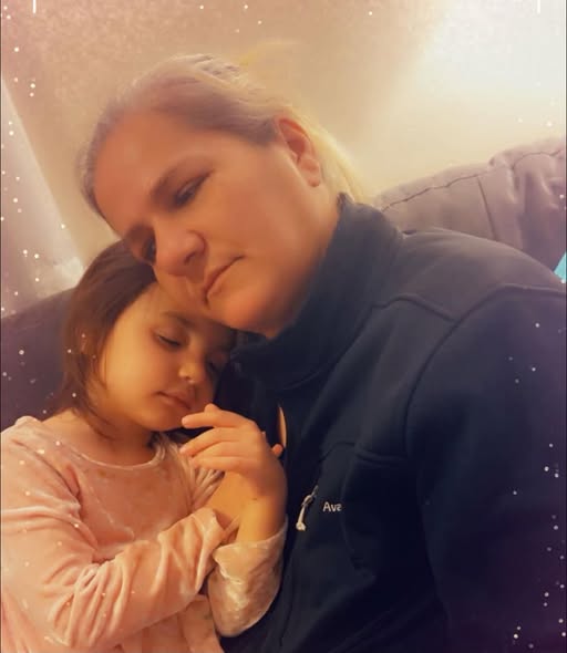 Twila Tanner, 51, shares a tender moment with a young girl in a touching family photo. The beloved mother and grandmother was tragically killed while reportedly helping a friend protect her family during the Erie massacre. | Source: Facebook/AlissaSue