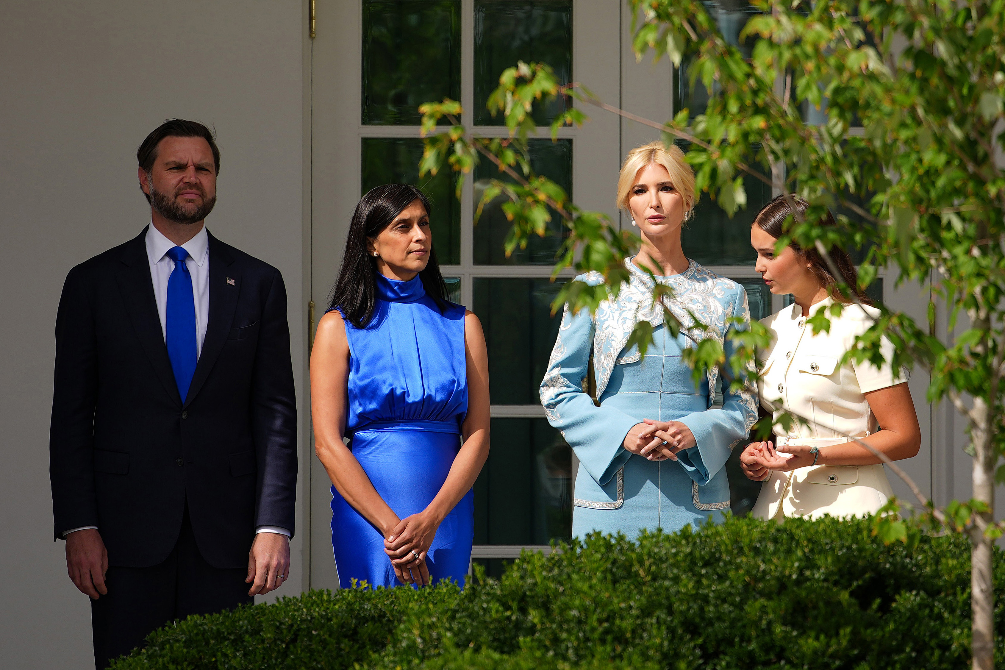 Ivanka Trump and daughter Arabella Kushner stood alongside U.S. Vice President JD Vance and Second Lady Usha Vance to observe the Military Review in the Rose Garden of the White House on September 24, 2026, in Washington, DC. Framed behind lush garden greenery, Arabella leaned in to speak with Ivanka, who stood with her hands clasped in her powder-blue ensemble, while Usha—elegant in a sleeveless cobalt-blue dress—and JD Vance looked on during the official state visit ceremonies honoring Chinese President Xi Jinping. | Source: Getty Images