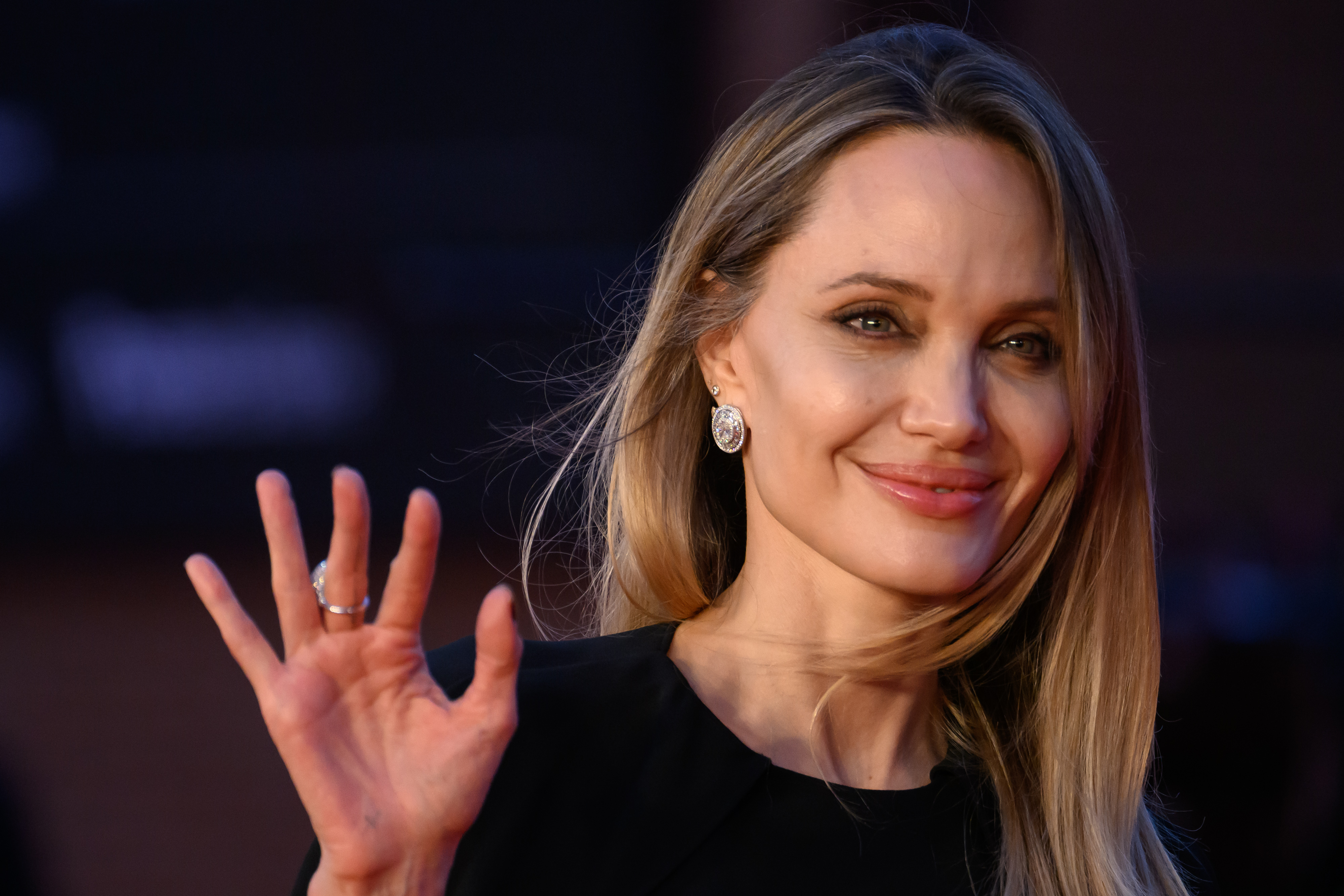 Angelina Jolie attends the Rome Film Festival on October 18, 2025. After photos from the pickleball event surfaced, some social media users compared them with images from Jolie's other public appearances. | Source: Getty Images