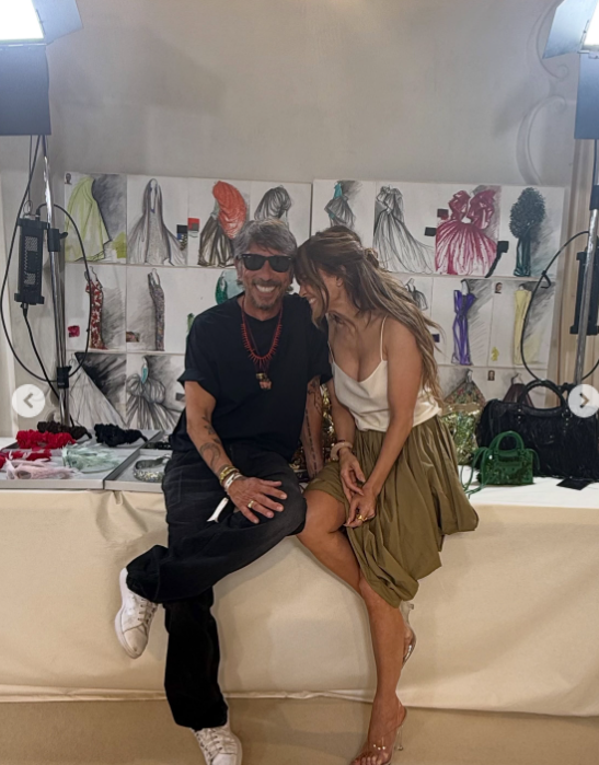 Jennifer also shared a visit with fashion designer Pierpaolo Piccioli, posing in front of sketches and accessories from his studio. The stop added a fashion highlight to a post otherwise centered on birthdays and family. | Source: Instagram/jlo