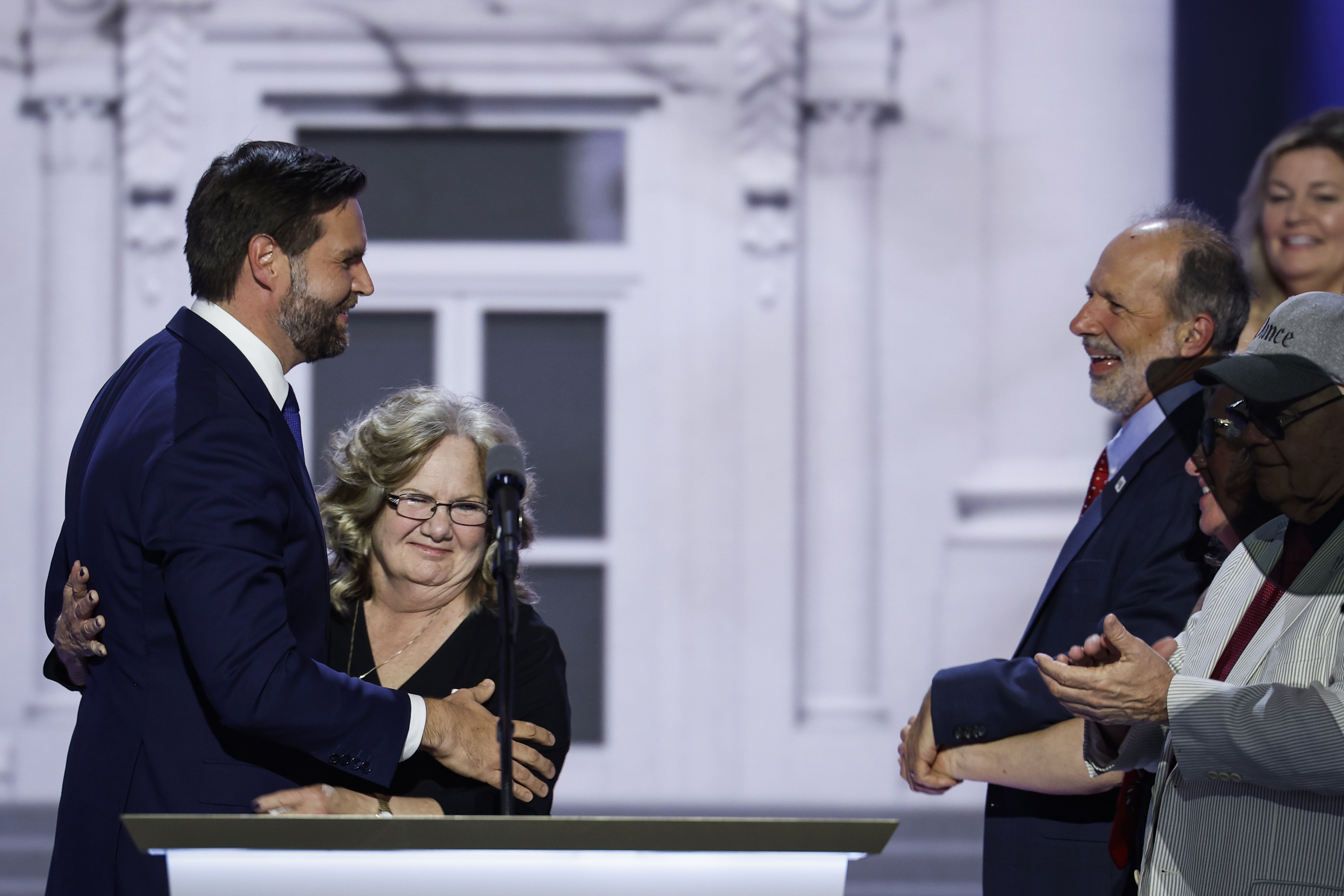 Vice President JD Vance embraces his mother, Beverly Vance Aikins, during an event in 2024. | Source: Getty Images