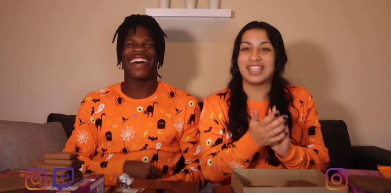 A screenshot of Travis Hunter and Leanna Lenee from a video dated October 21, 2022. | Source: YouTube/Travis and Leanna