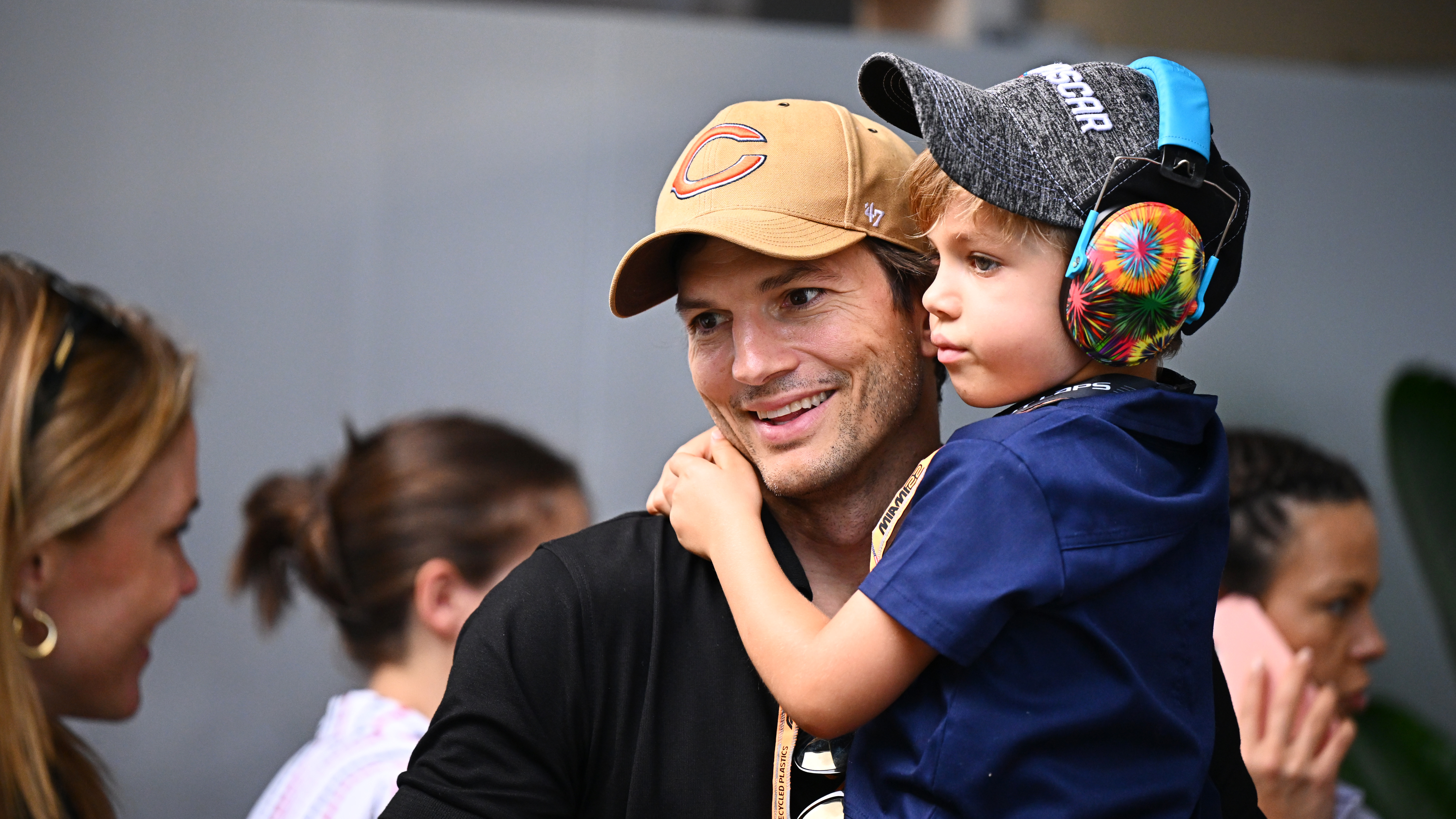 Ashton Kutcher and his son Dimitri in the Paddock ahead of the F1 Grand Prix of Miami at the Miami International Autodrome on May 08, 2022, in Florida. | Source: Getty Images