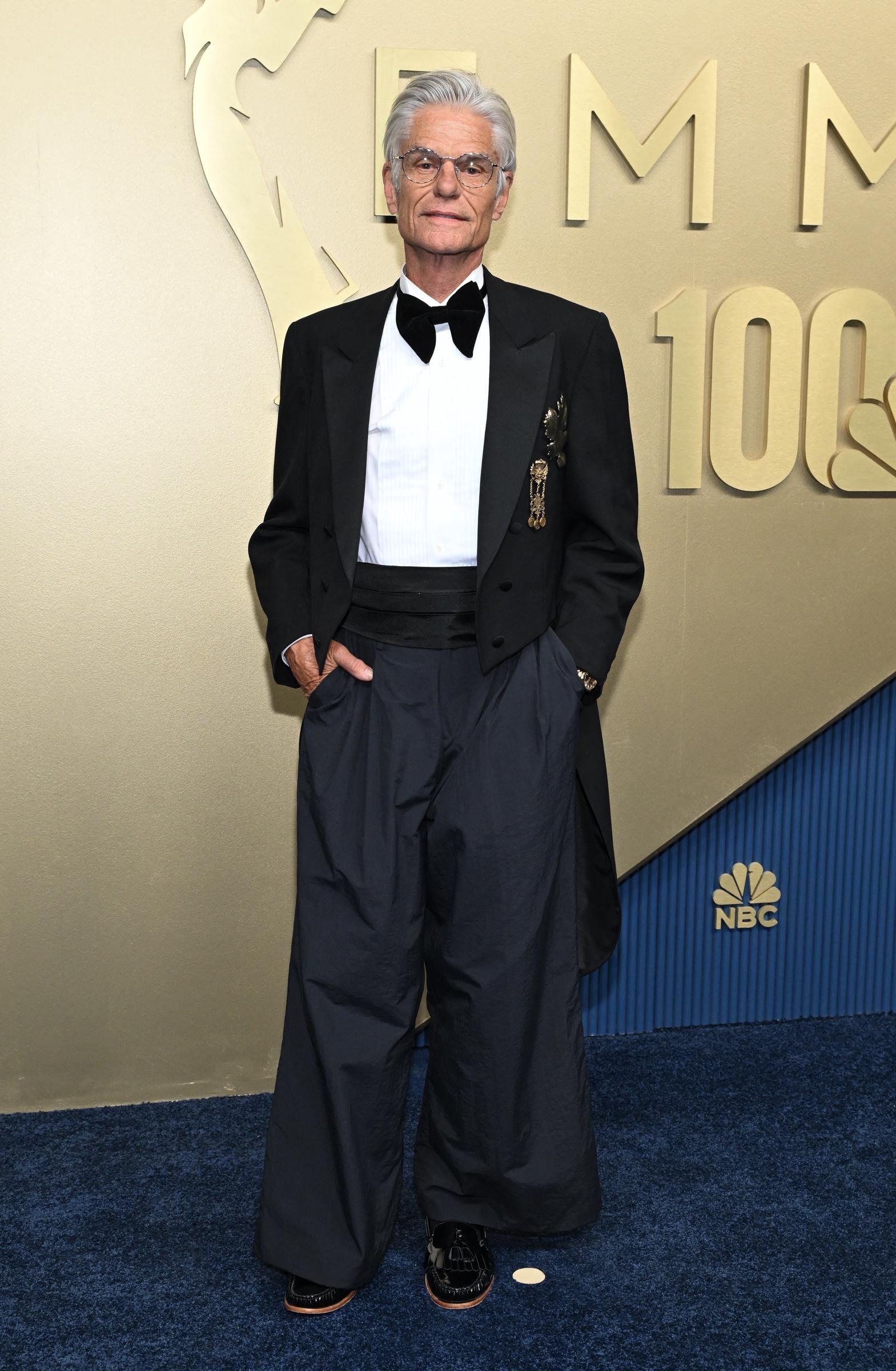 Hamlin's wide-legged tuxedo trousers quickly became a conversation piece, proving that even a classic black-and-white outfit can split opinion. The reactions ranged from playful jokes to enthusiastic compliments, making his look one of the night's most dissected. | Source: Getty Images