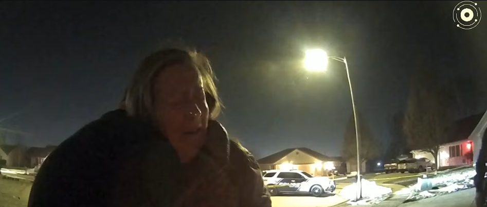 Bodycam footage showing Caleb Flynn hugging the grandmother of his children while both sobbed, dated March 2, 2026 | Source: YouTube/Law&Crime Network