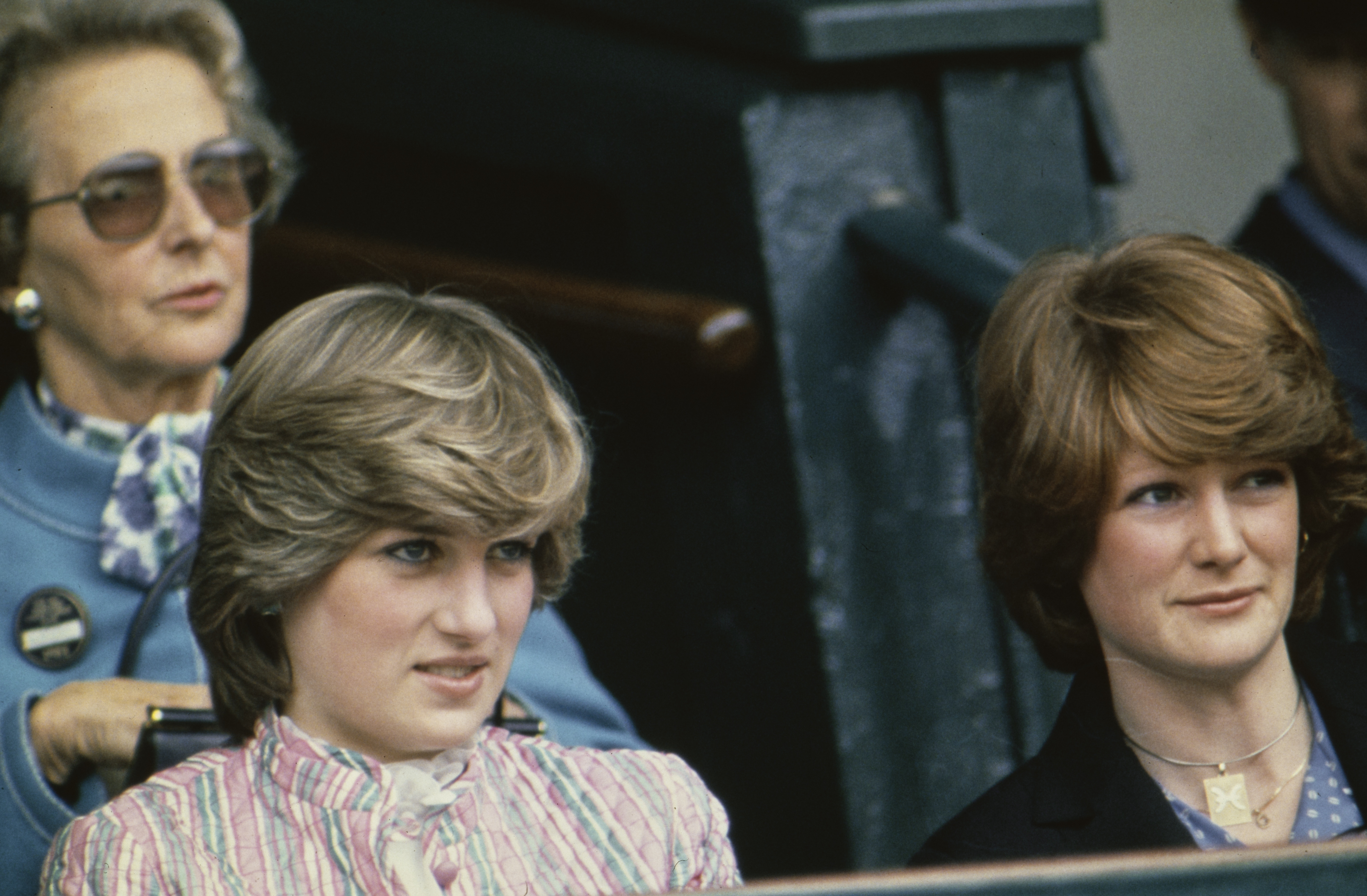 Unlike the Windsor side, the Spencers stayed much closer to the Sussexes. In this photo, Lady Diana Spencer and her sister, Lady Sarah Spencer watched the Ladies' Final match at the Wimbledon Championships on July 3, 1981, in London, England. | Source: Getty Images