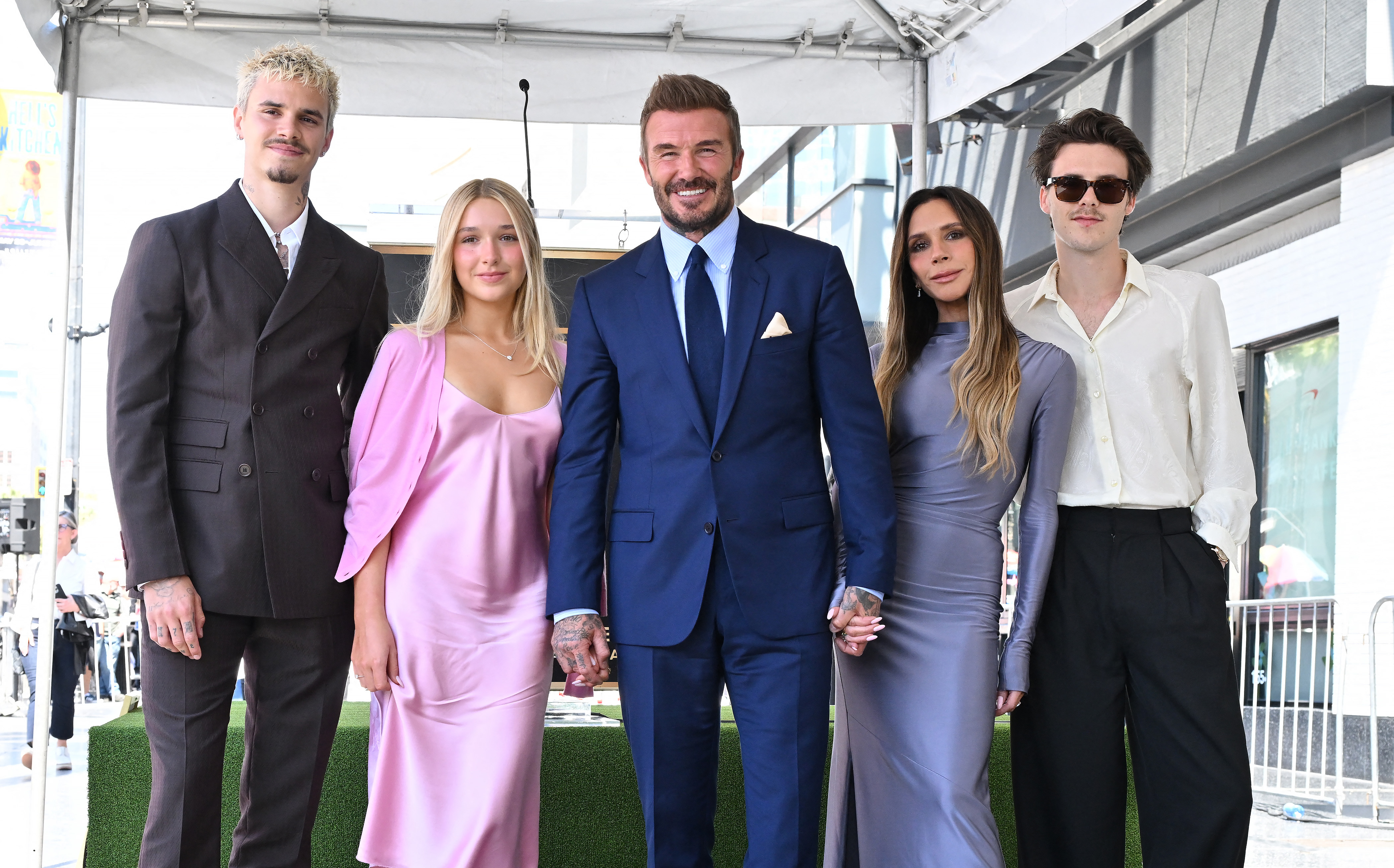 The family doesn't always coordinate, but they all looked fashionable. At this event, they posed next to his newly unveiled Hollywood Walk of Fame star during a ceremony in Hollywood, California, on June 12, 2026. | Source: Getty Images