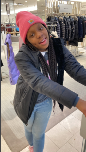 Taylor Hamilton is in a clothe store. | Source: GoFundMe