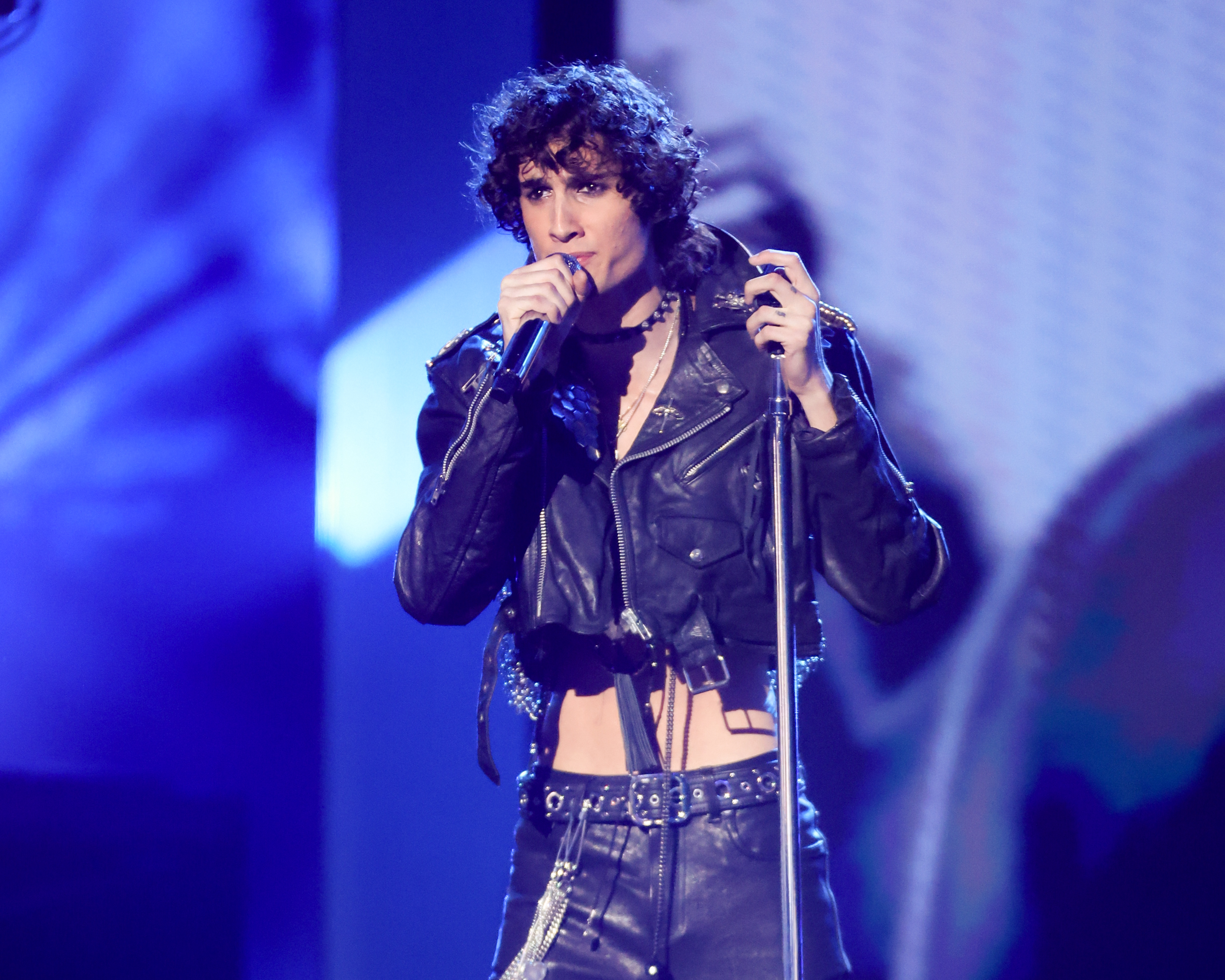 Sombr takes the stage in George Michael's customized leather jacket from the "Faith" era while performing during the 2026 MTV Video Music Awards tribute. | Source: Getty Images