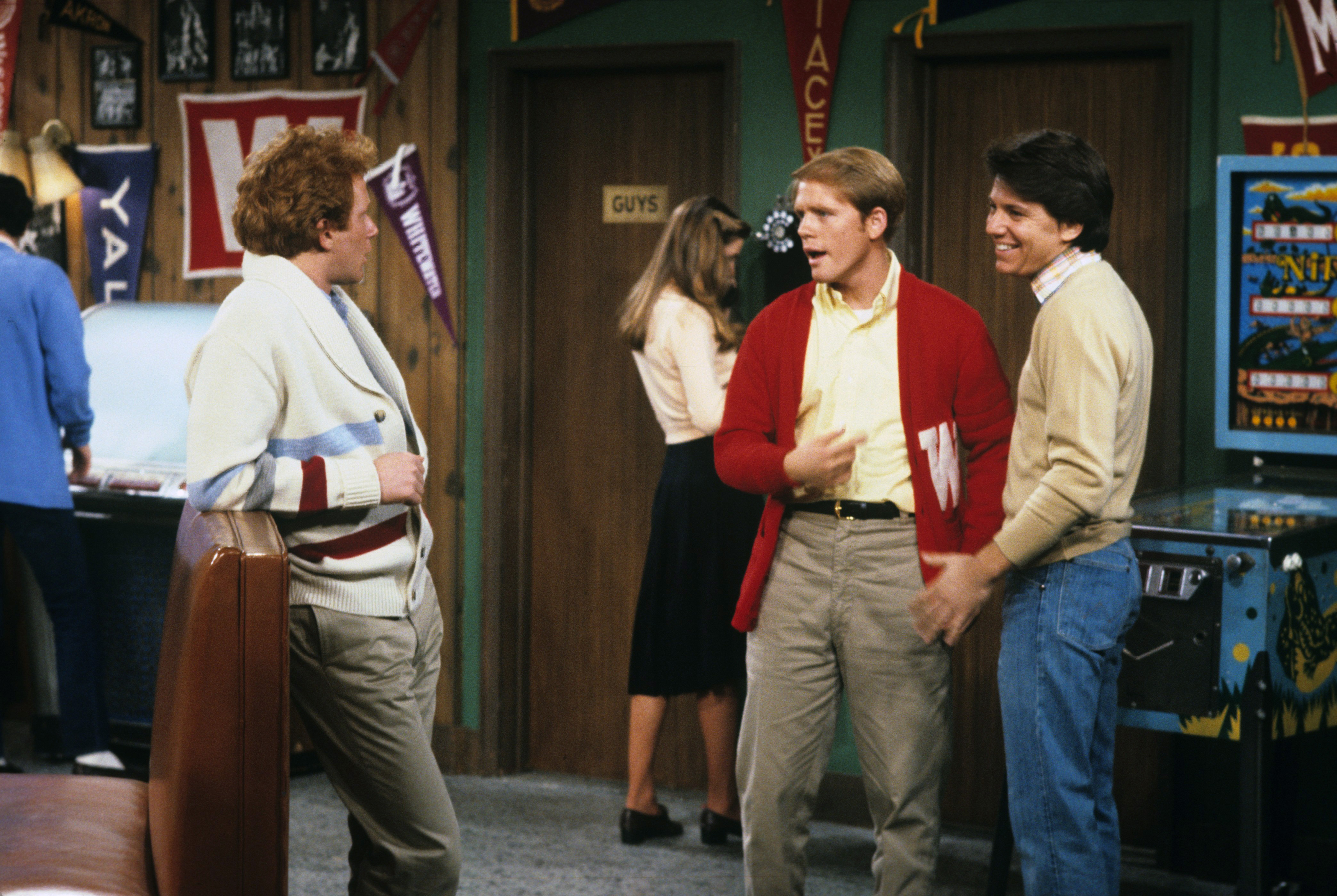 Anson Williams is pictured with fellow "Happy Days" stars Donny Most and Ron Howard in a scene from the beloved sitcom. | Source: Getty Images