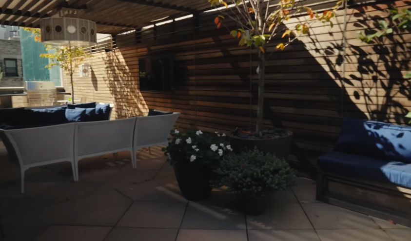 The terrace adds a rare outdoor escape to the couple's New York home. It also gives the townhouse another layer of luxury beyond the dramatic interiors. | Source: YouTube/Architectural Digest
