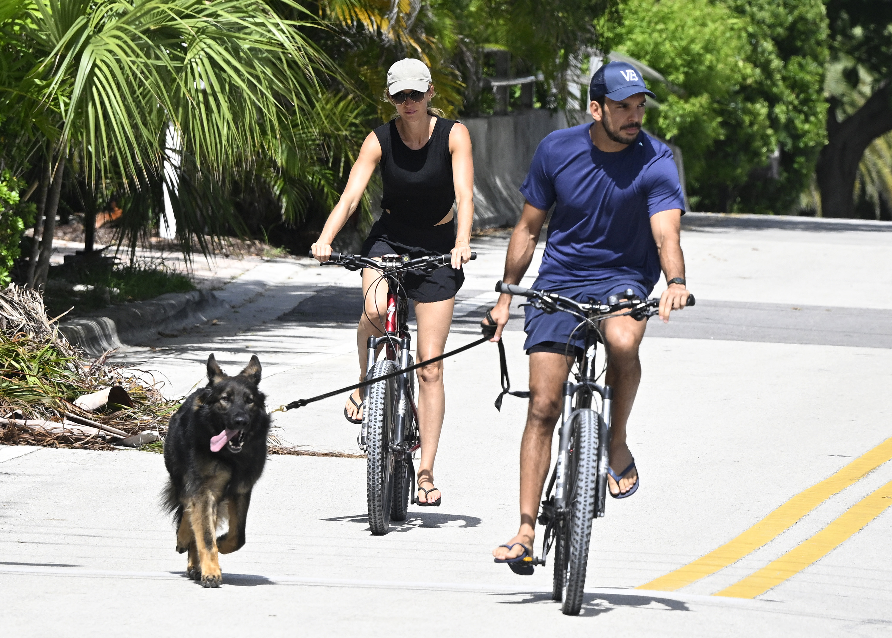 Joaquim Valente and Gisele Bündchen are seen biking in Surfside, Florida, on July 14, 2024 | Source: Getty Images