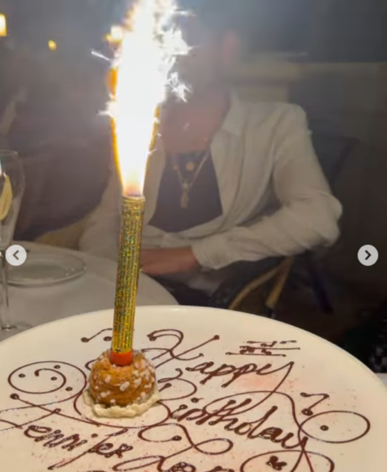 One birthday dinner included a dessert topped with a sparkling candle and a handwritten birthday message. Jennifer mixed these celebratory details with more intimate family moments throughout the post. | Source: Instagram/jlo