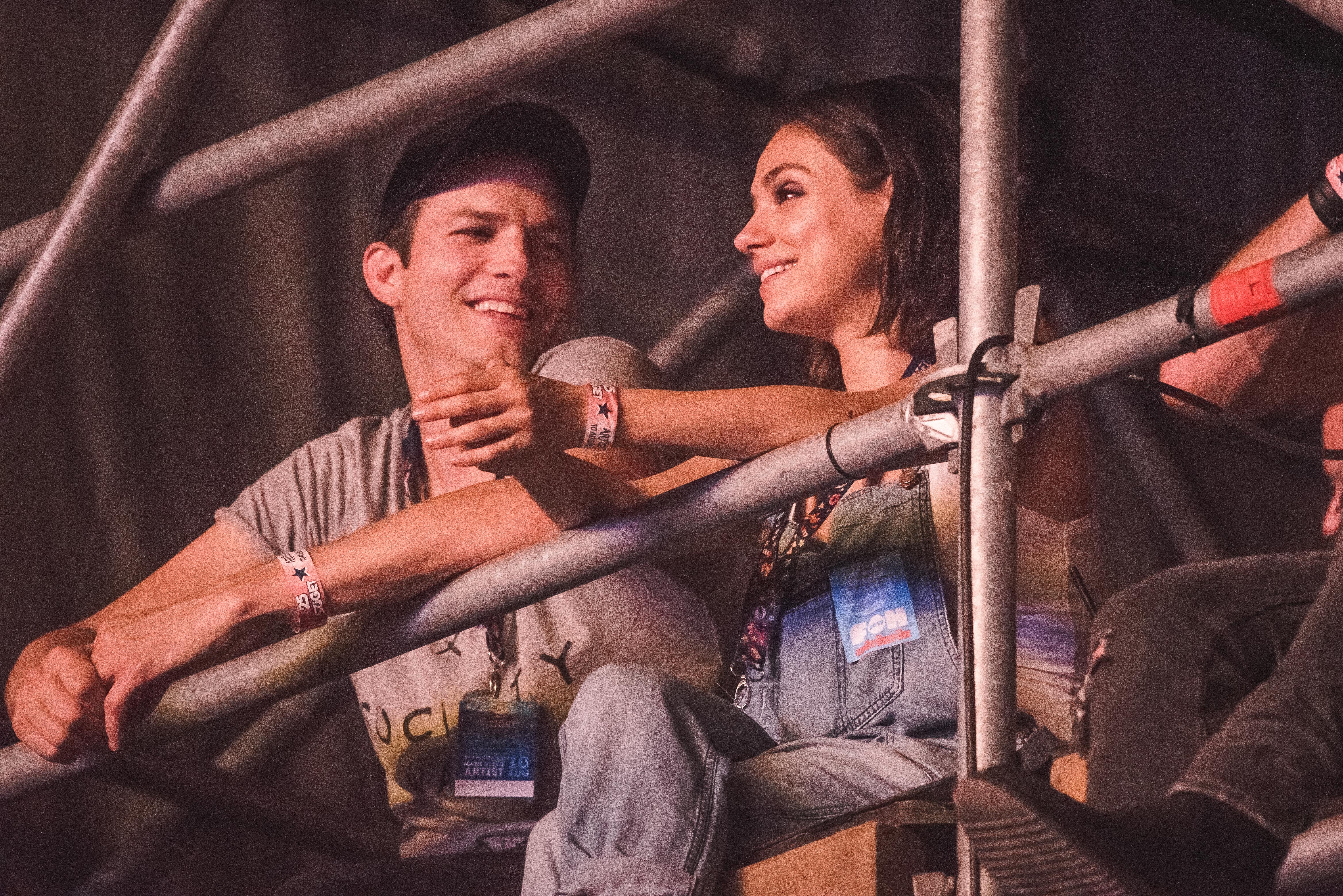 Ashton Kutcher and Mila Kunis watching Wiz Khalifa's set during Day 2 of Sziget Festival 2017 on August 10 in Budapest, Hungary. | Source: Getty Images