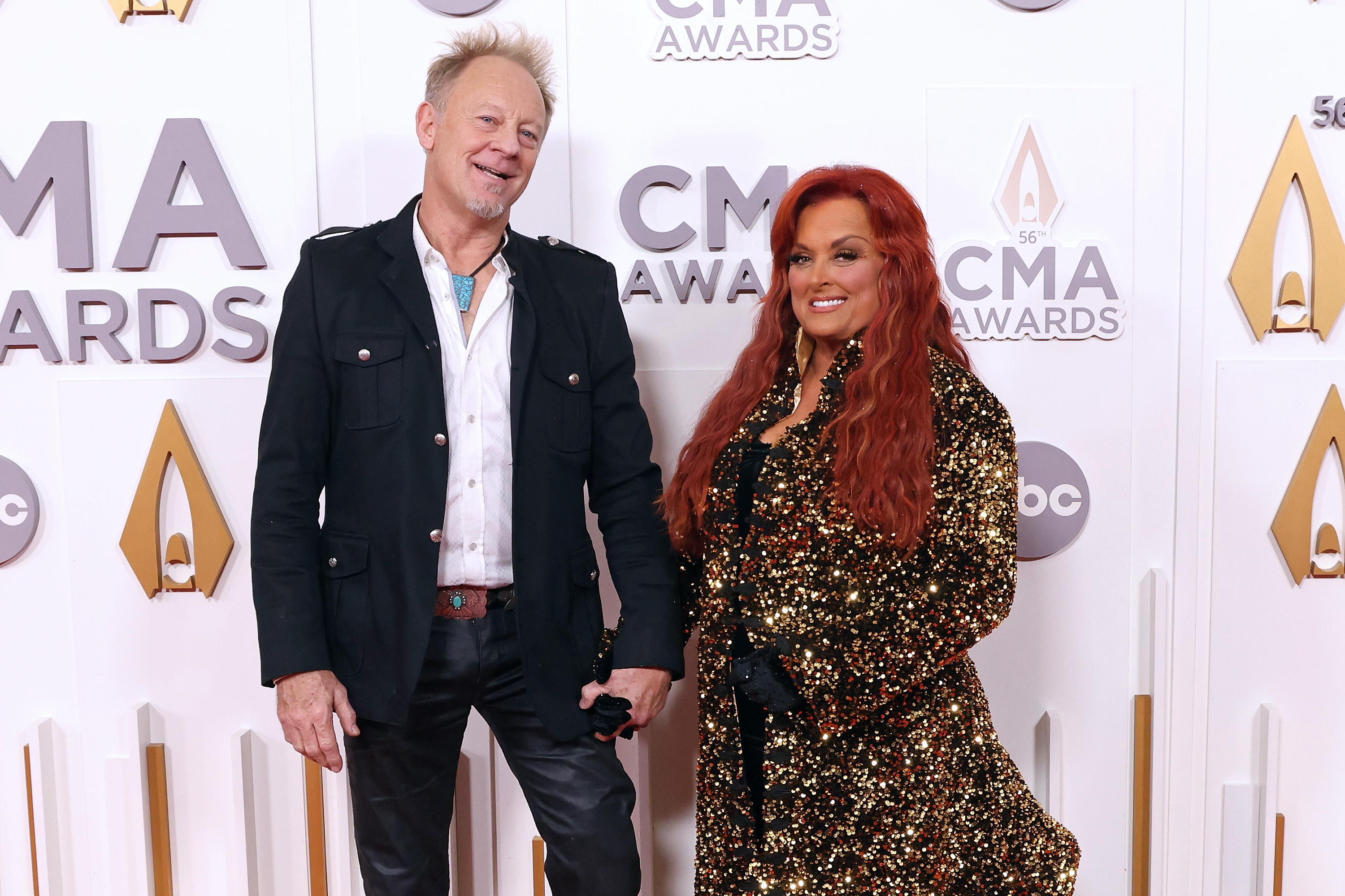 Wynonna smiles alongside her husband, Cactus Moser, at the CMA Awards in Nashville on November 9, 2022. The couple married in June 2012, and their life together includes the Tennessee property where Wynonna has made her home. | Source: Getty Images