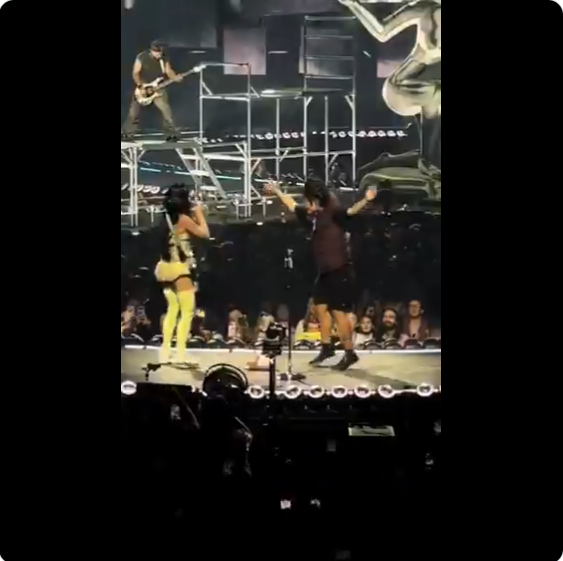 The man dancing on stage as Katy Perry moves away, from a post dated June 9, 2025 | Source: X/concertleaks