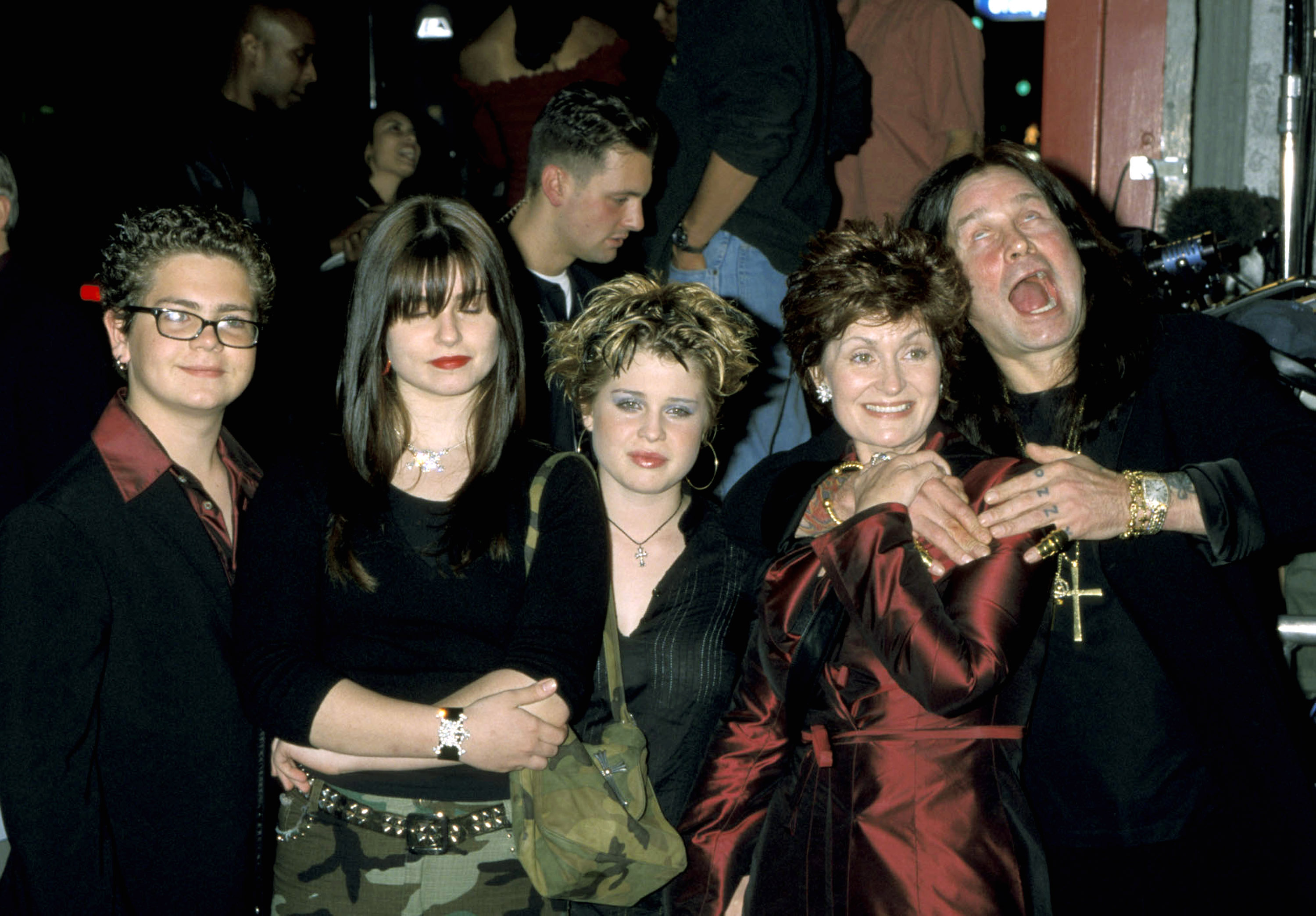 The Osbourne family—Jack, Aimee, Kelly, Sharon, and Ozzy—pose together during the early years of their rise to reality TV fame, a period that turned them into household names around the world. | Source: Getty Images