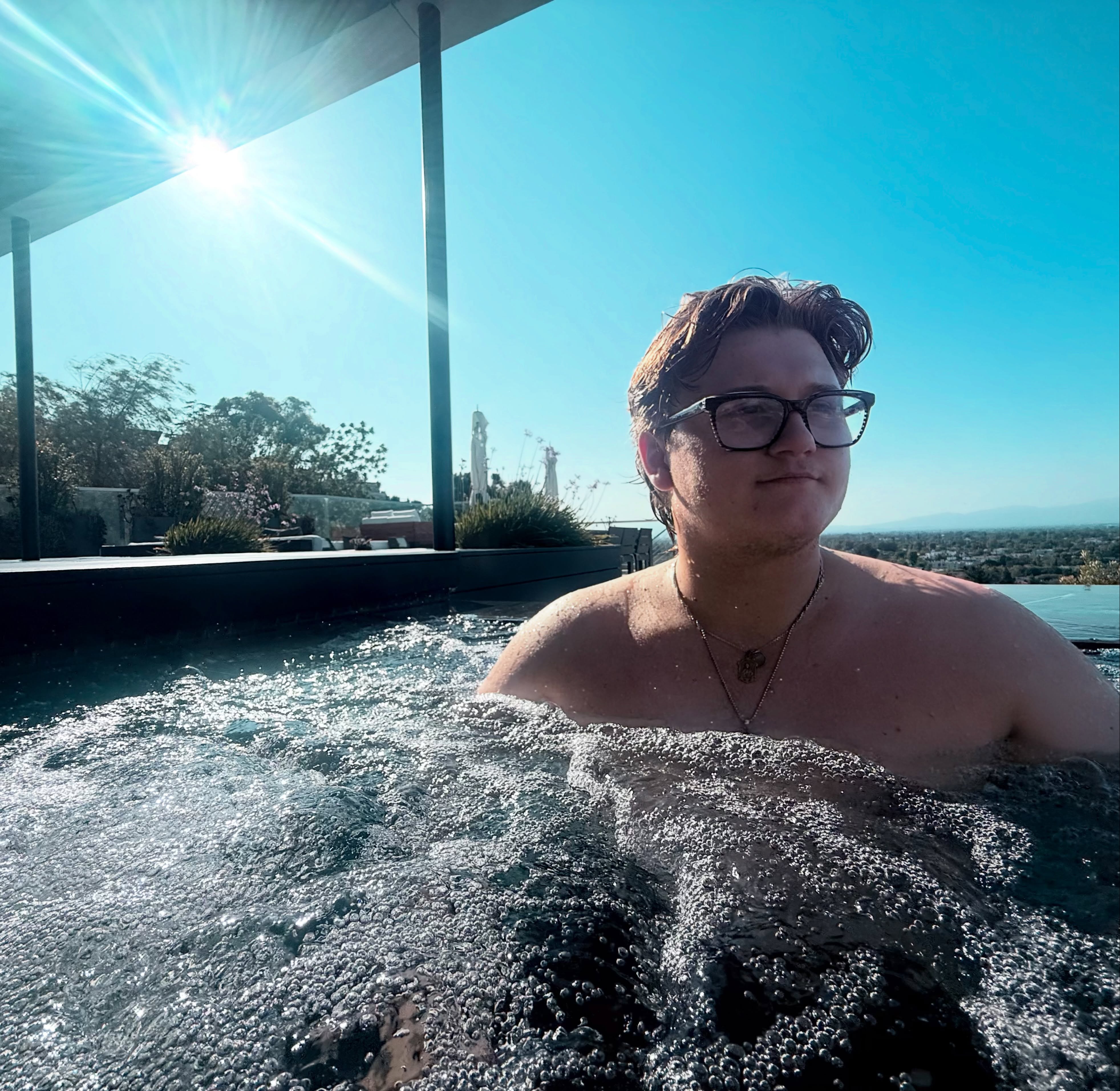 Gavin Rossdale's middle son, Zuma Rossdale, in a jacuzzi, from a post celebrating his birthday on August 21, 2026. | Source: Facebook/Gavin Rossdale