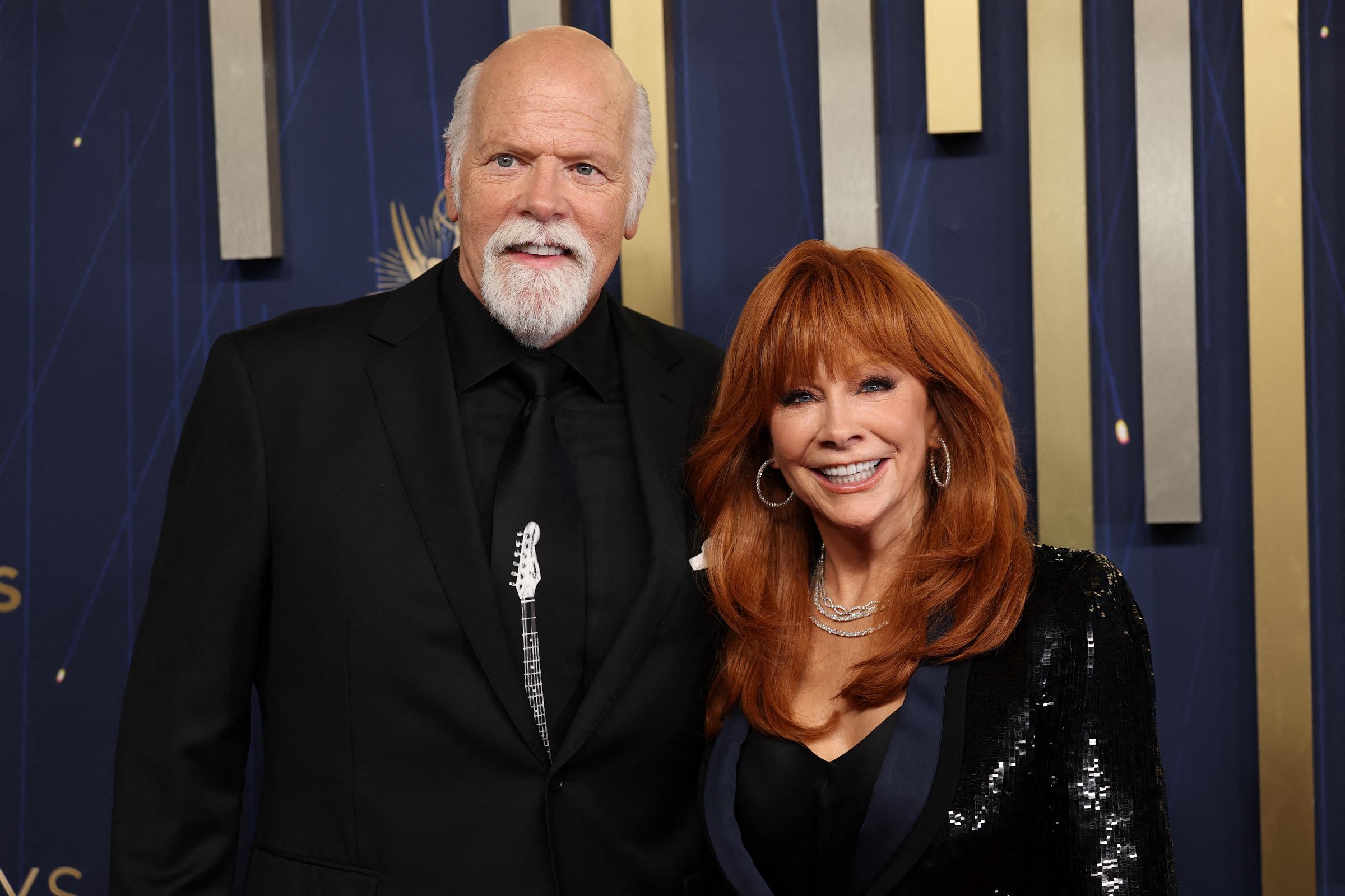 Reba McEntire and Rex Linn attended the 2025 Emmy Awards together while engaged. The following year, McEntire revealed how their busy television schedules were affecting their wedding plans. | Source: Getty Images